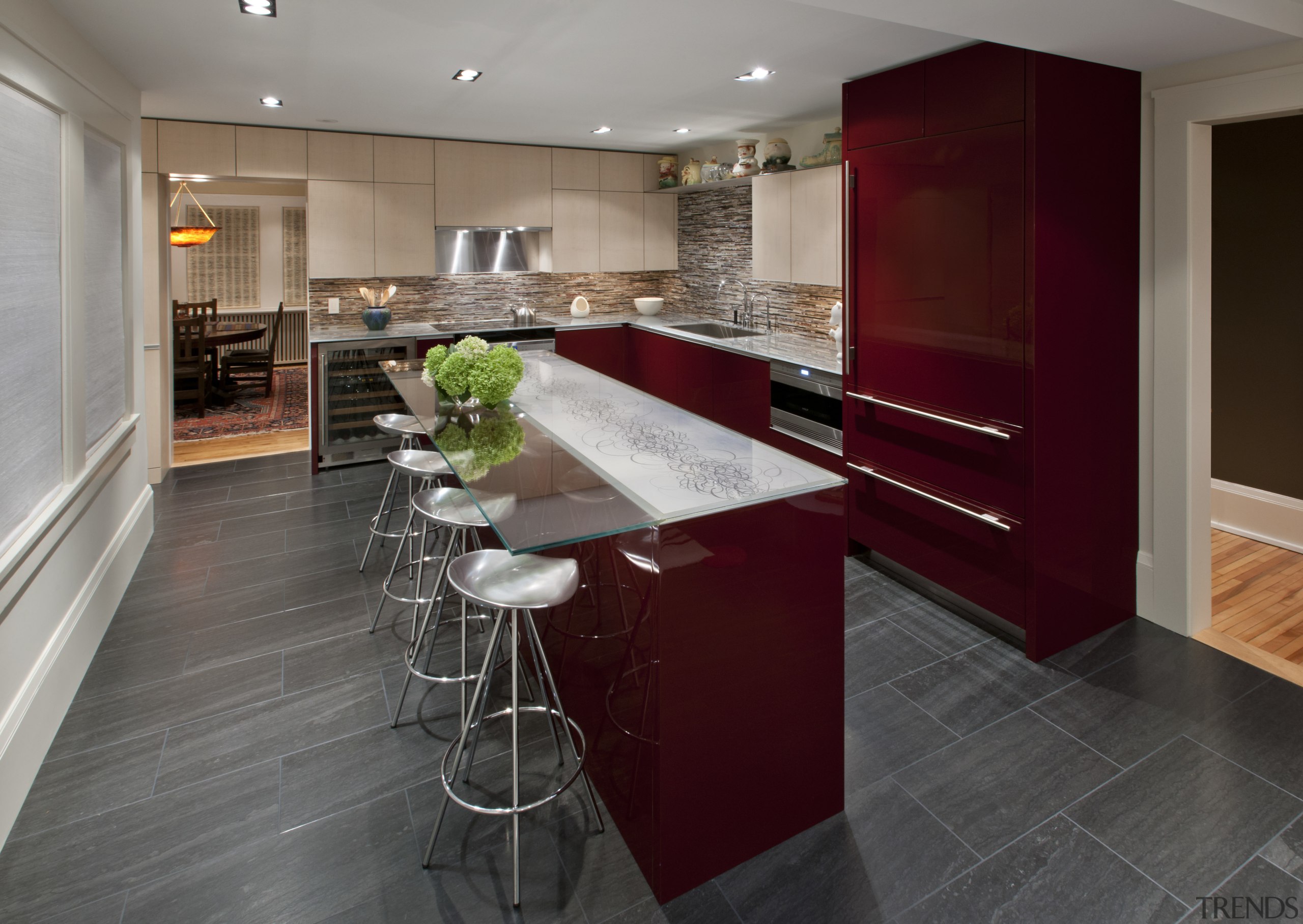 Contemporary kitchen featuring red automotive paint on lower architecture, cabinetry, countertop, cuisine classique, floor, flooring, hardwood, interior design, kitchen, laminate flooring, real estate, room, wood flooring, gray