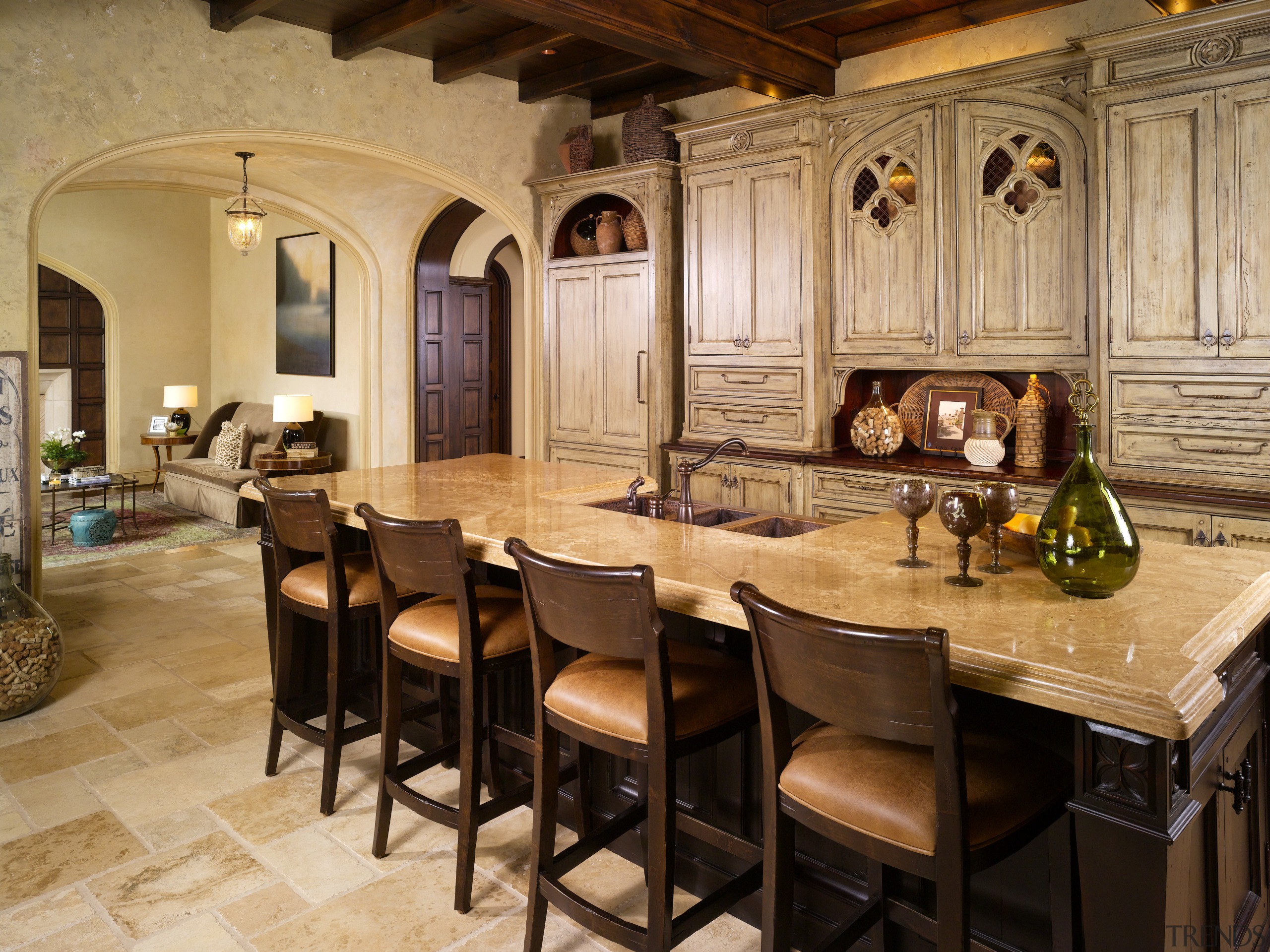 View of traditionally styled kitchen with Tudor-style arch, countertop, cuisine classique, dining room, interior design, kitchen, orange, brown