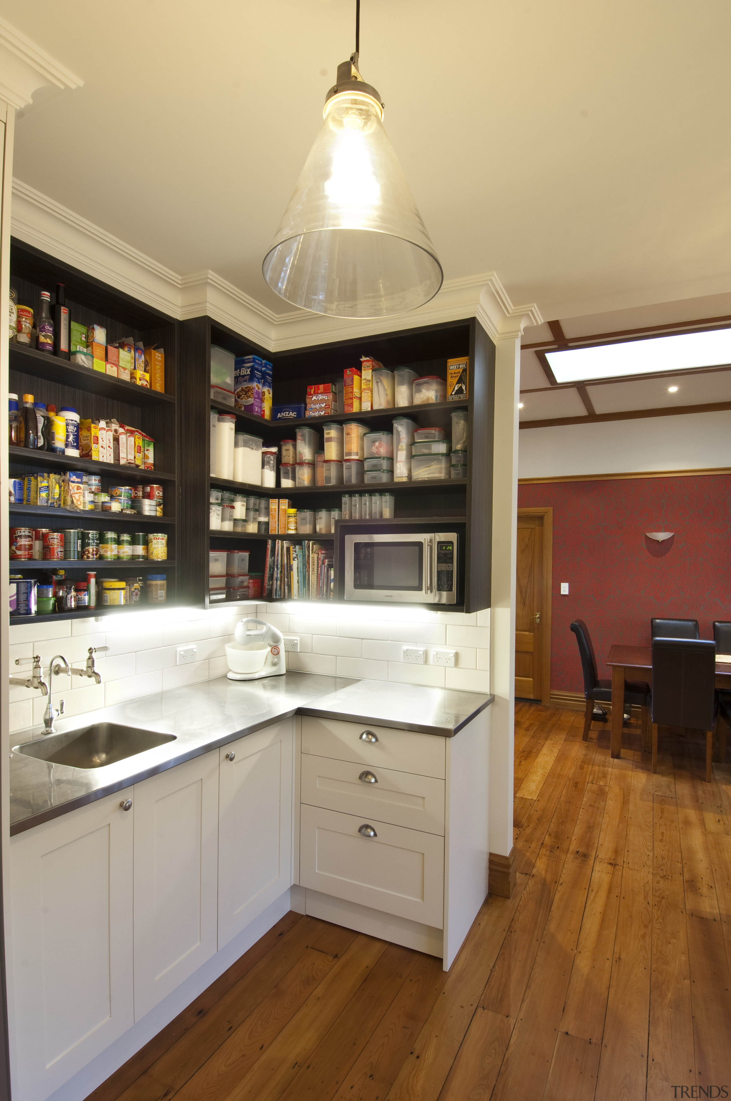 This kitchen was designed by Debra DeLorenzo of cabinetry, countertop, interior design, kitchen, room, orange, brown