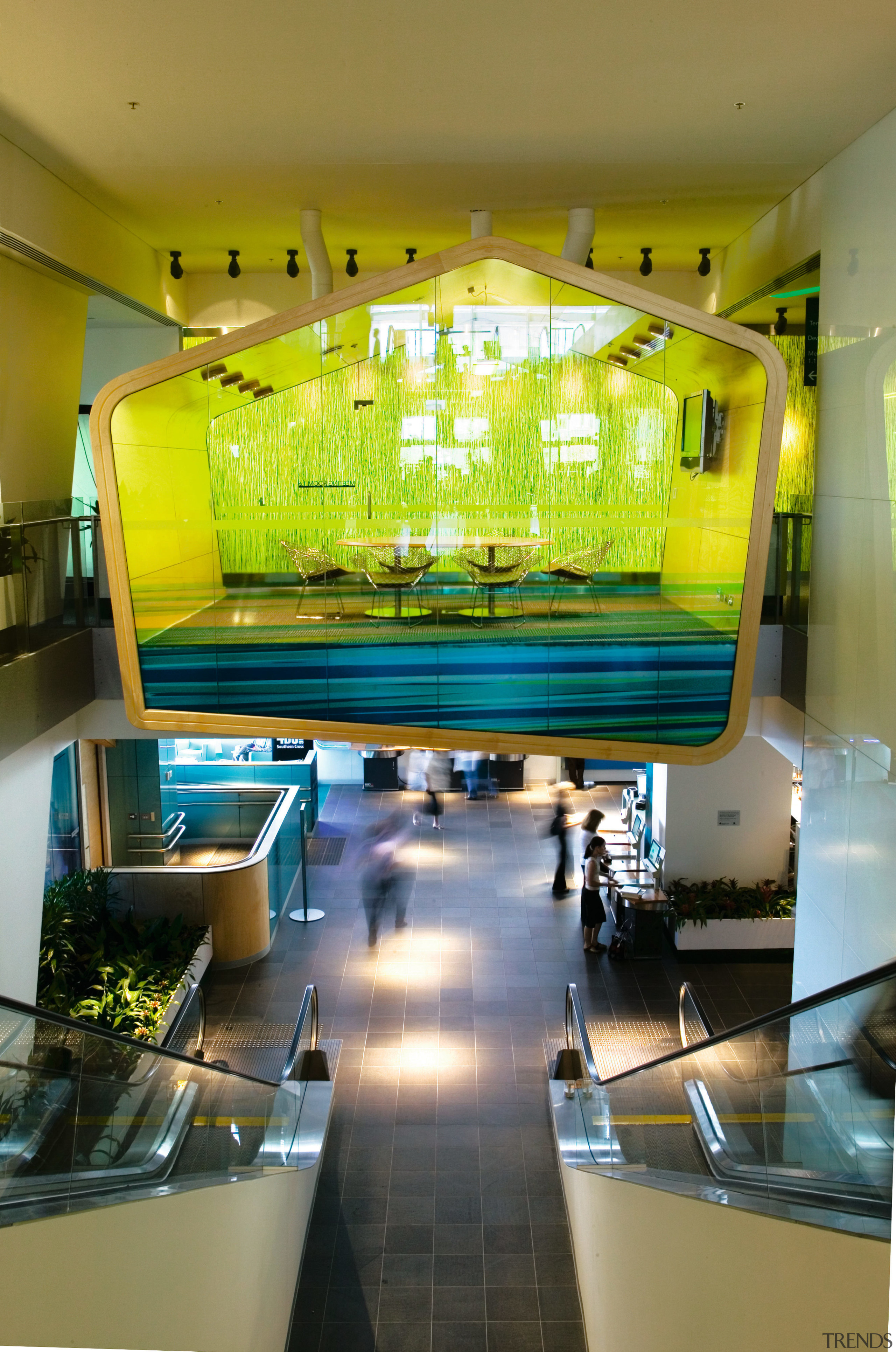 A view of the the dramatic floating pod interior design, table, brown