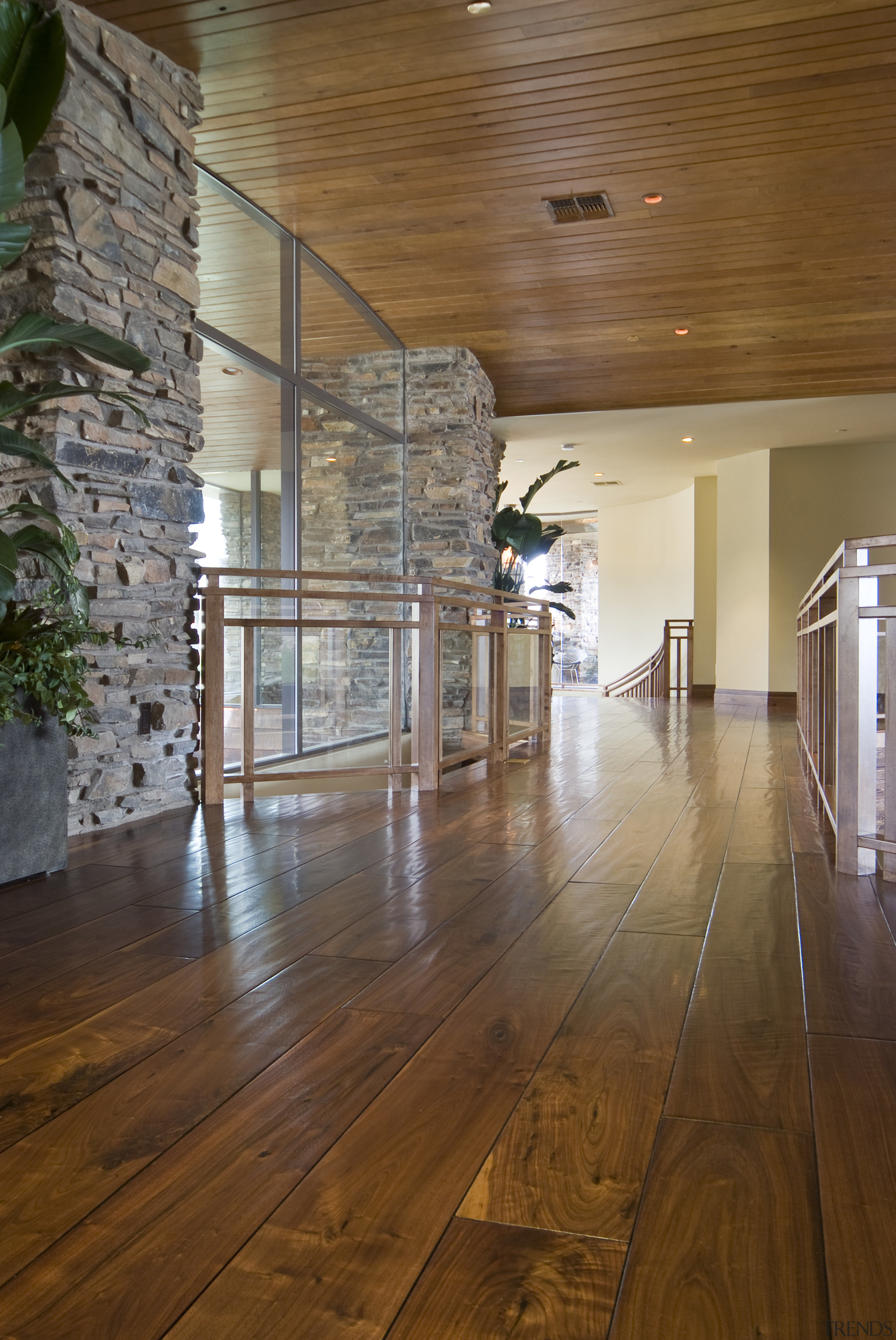 View of a hallway of this home which apartment, architecture, ceiling, daylighting, floor, flooring, hardwood, home, interior design, laminate flooring, lobby, real estate, wood, wood flooring, brown