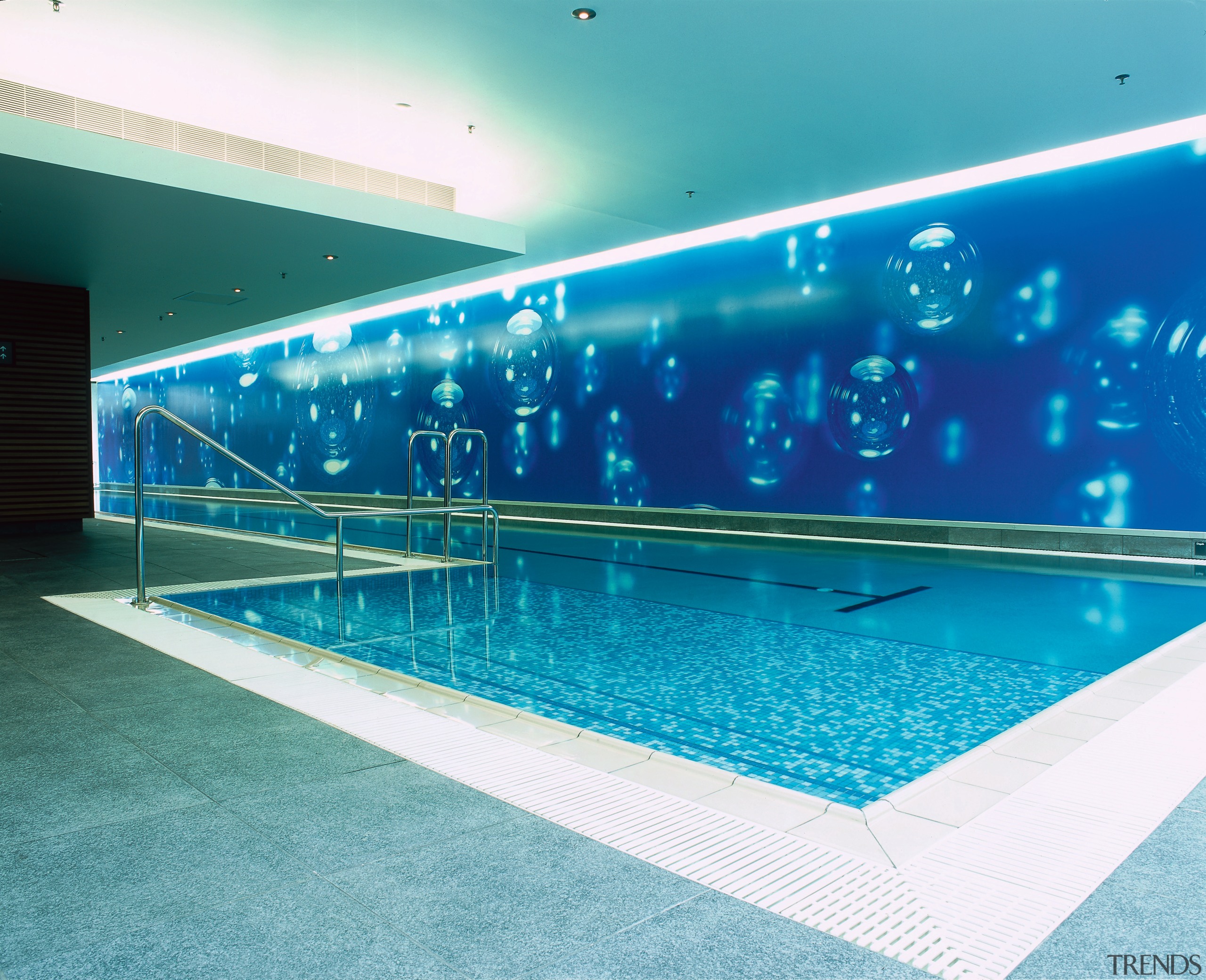 Indoor swimming pool with blue wall and tiling. leisure, leisure centre, pool, sport venue, swimming pool, water, teal