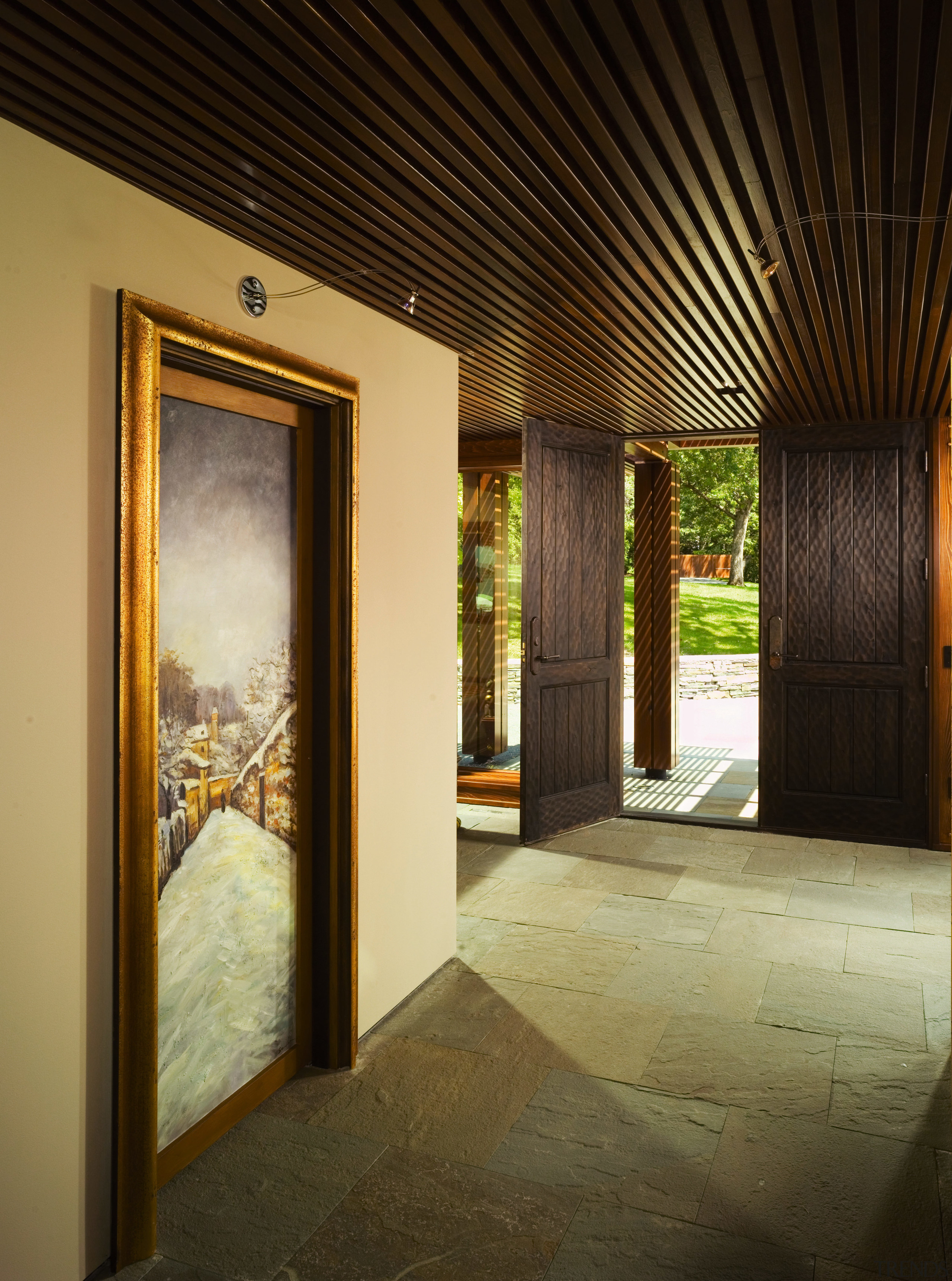 A view of the entrance hall, stone tiled architecture, ceiling, door, estate, home, house, interior design, lighting, lobby, property, real estate, window, wood, brown