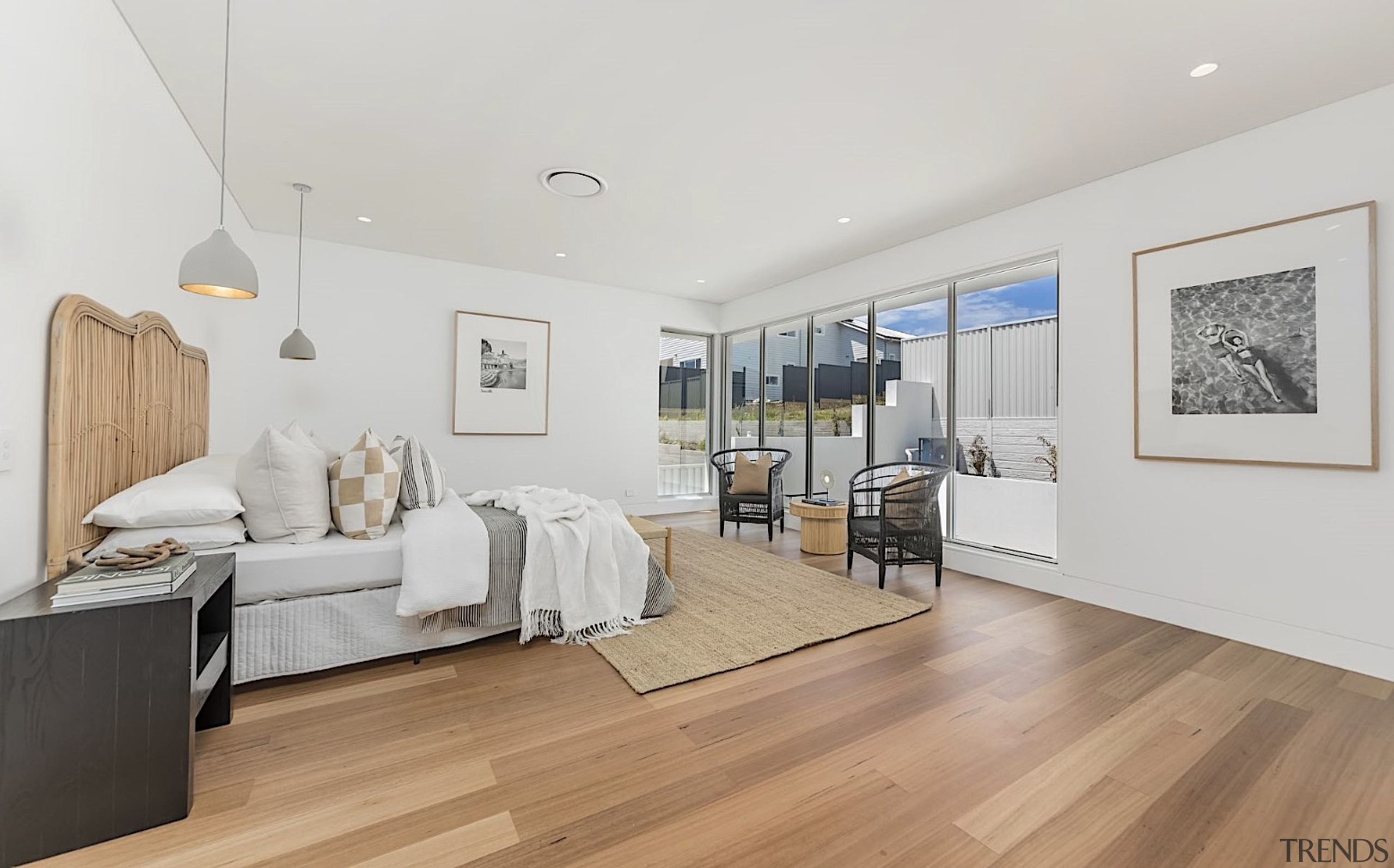 The generous wood floored master bedroom. - All 