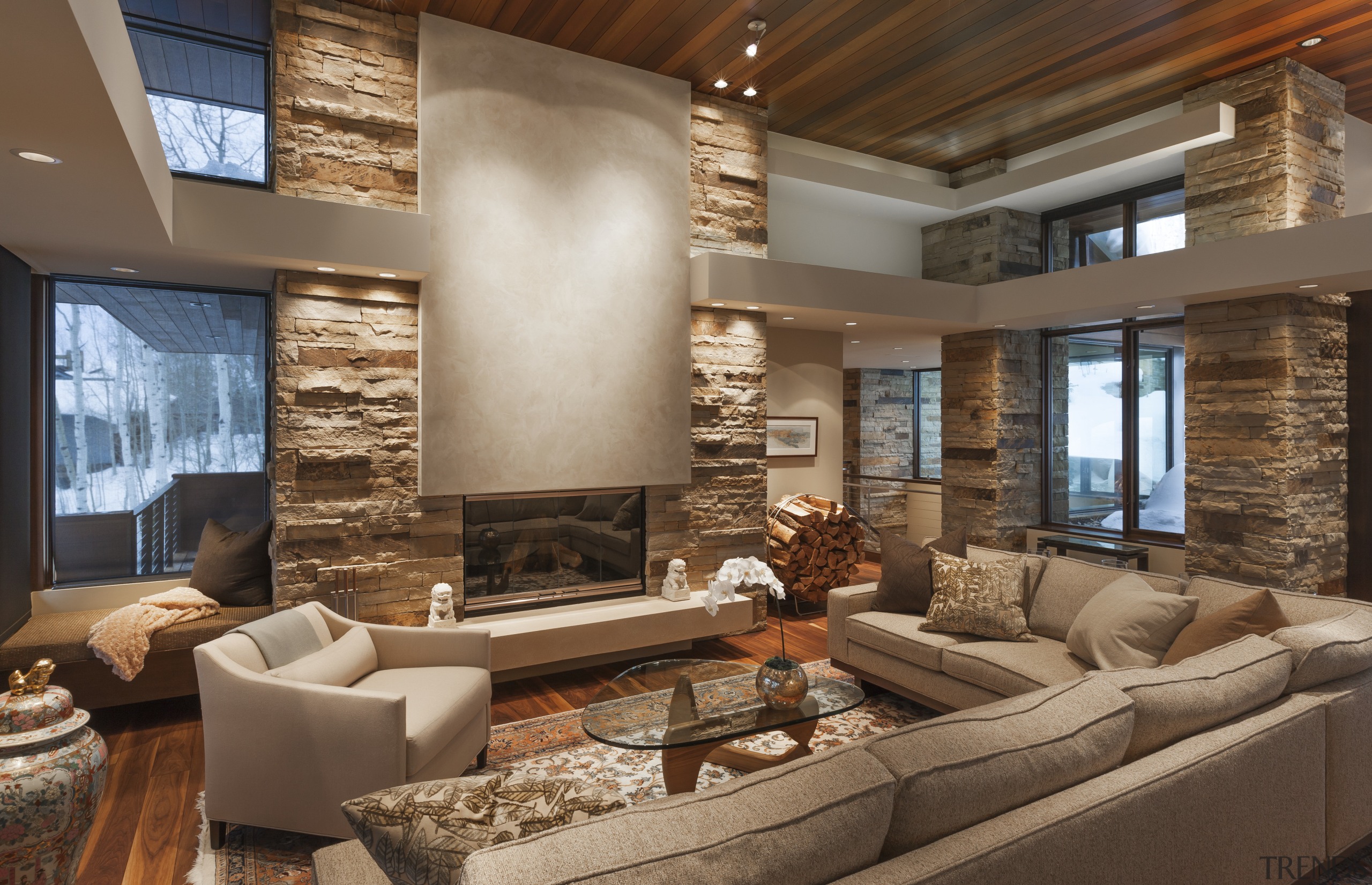 Dry-stacked limestone walls extend from the outside to ceiling, estate, fireplace, home, interior design, living room, real estate, room, window, brown