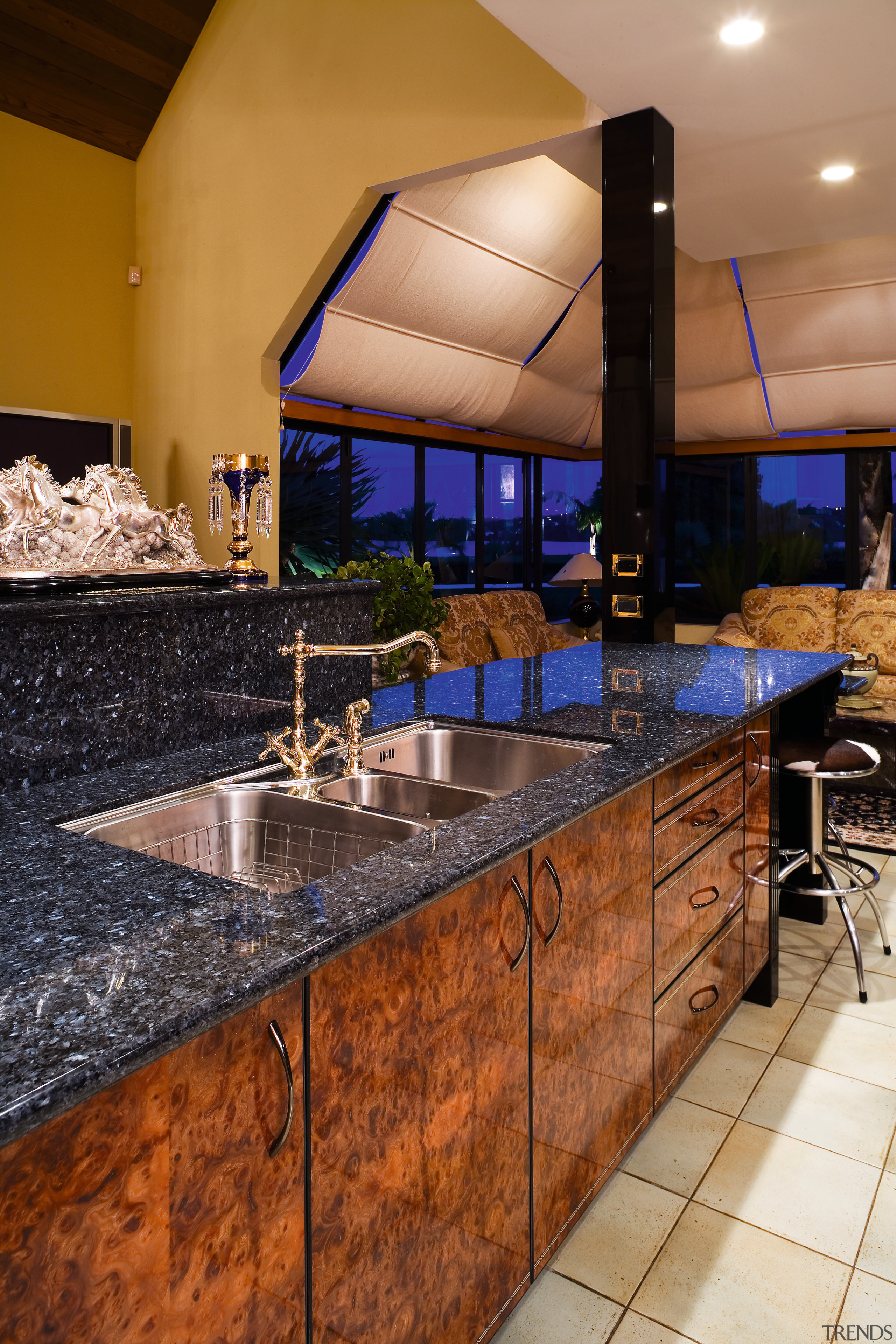 View of this kitchen featuring tiled flooring, lacquered countertop, interior design, kitchen, brown