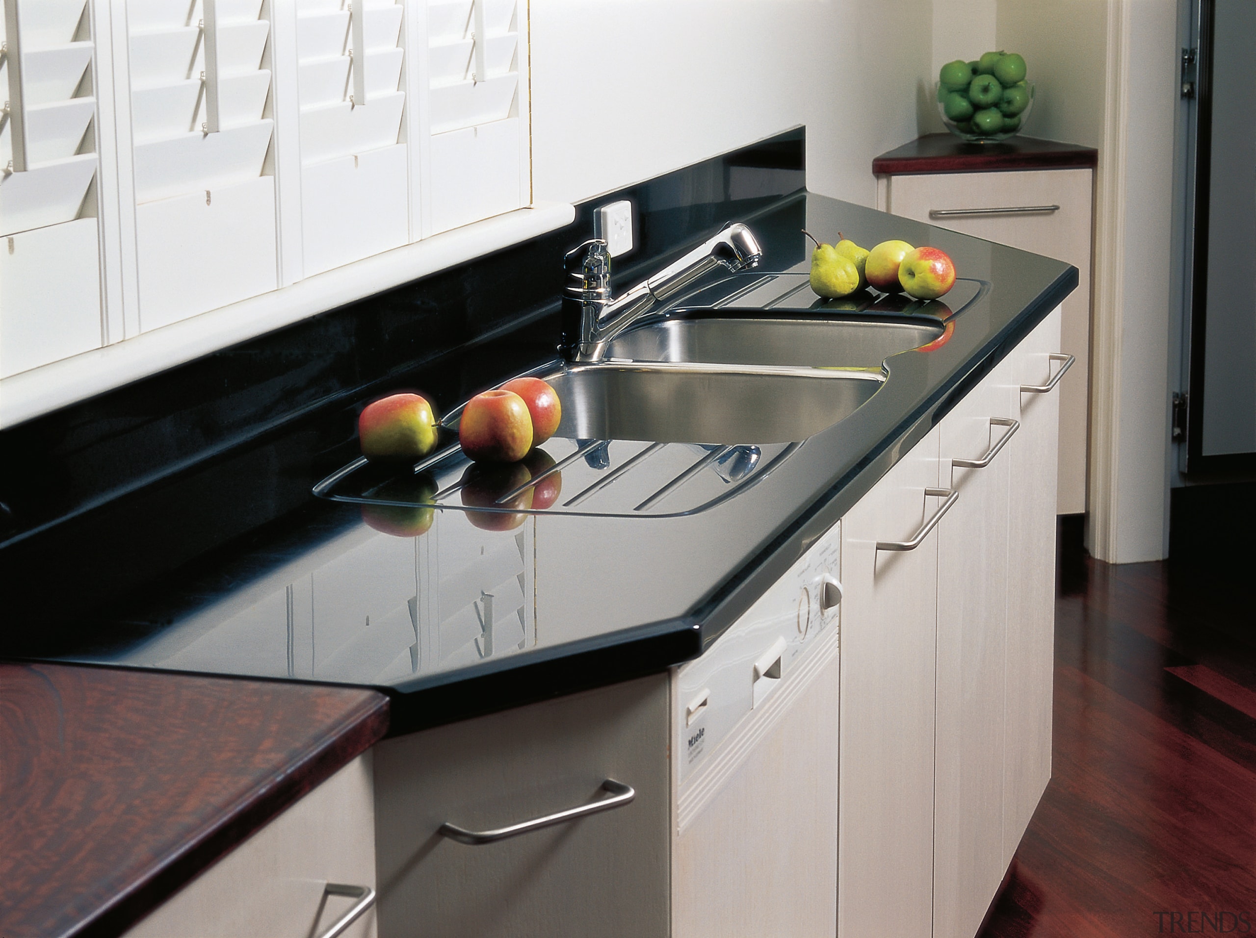 View of this kitchen cabinet unit with sink, countertop, interior design, kitchen, kitchen stove, sink, gray