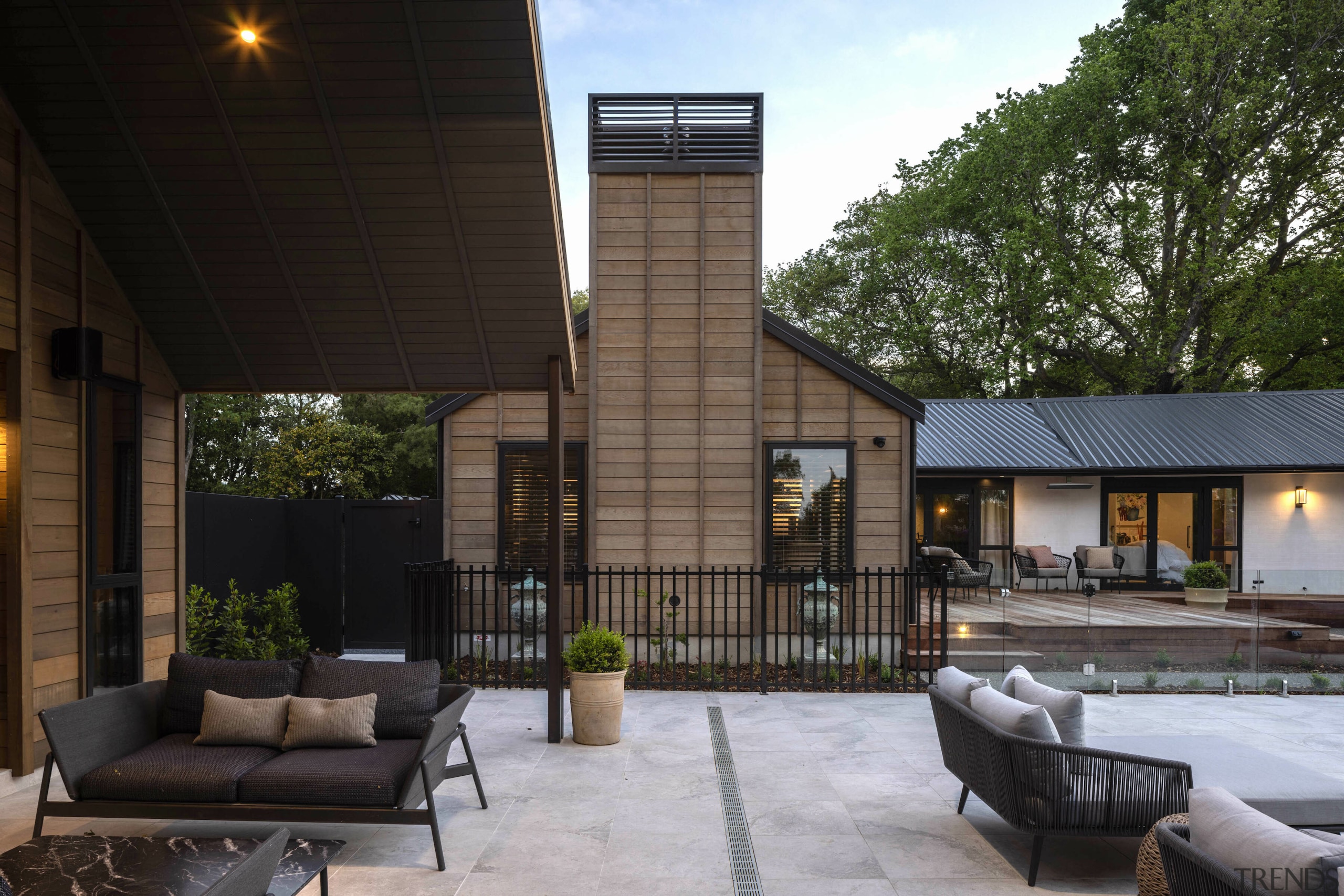 Pool, extension, and the original home at right. 
