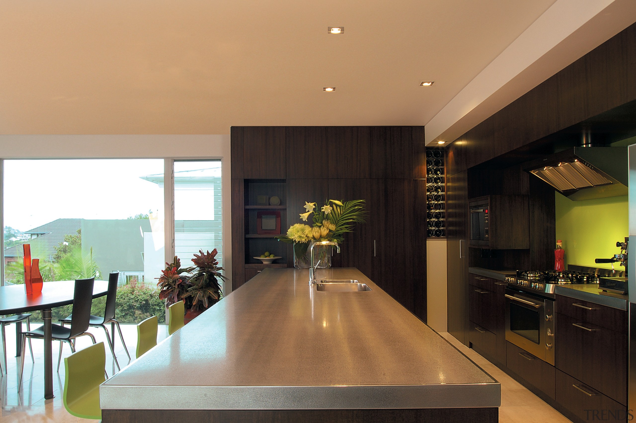 The view of a kitchen with a lime architecture, countertop, dining room, house, interior design, kitchen, real estate, room, black, orange
