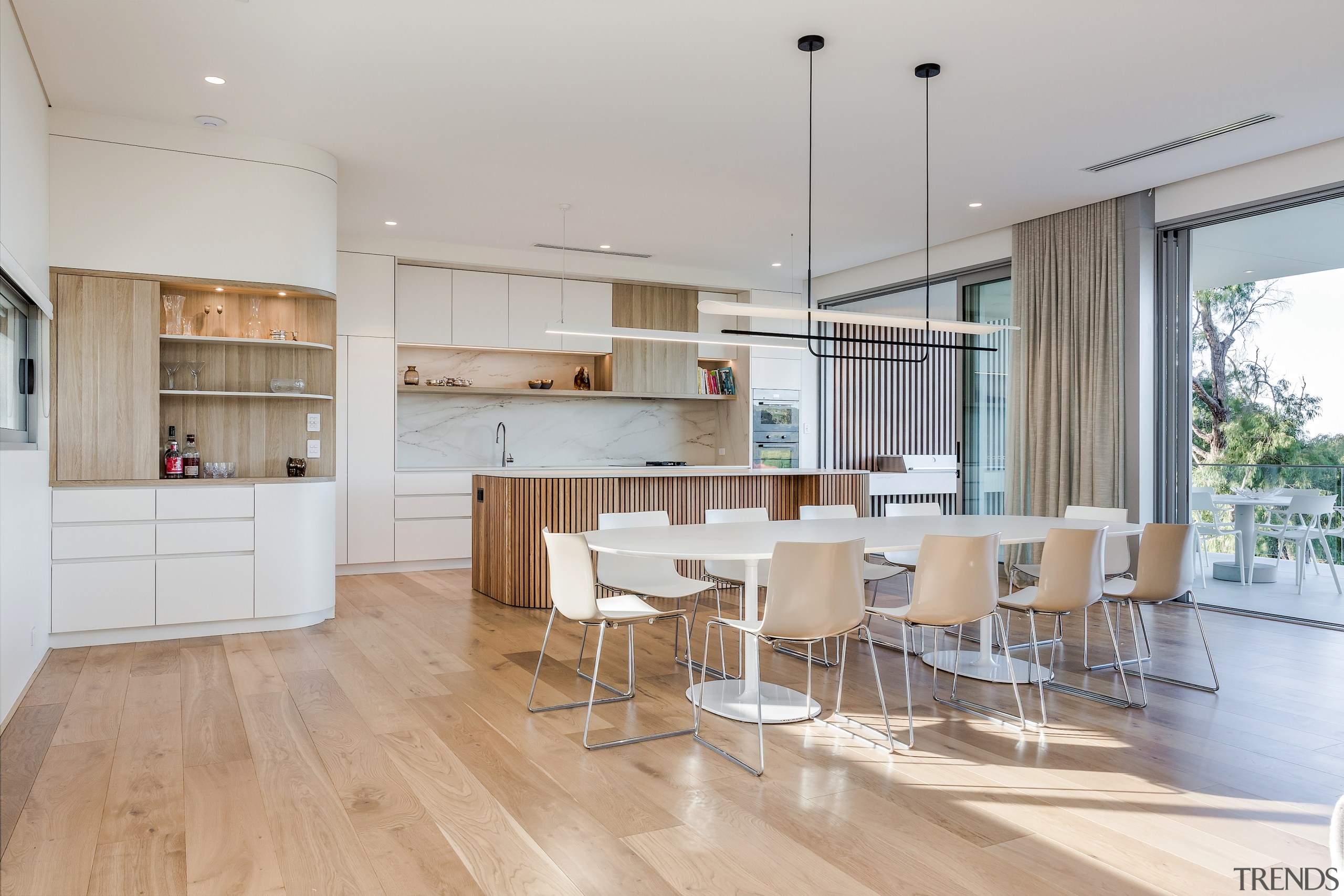 Dining, kitchen and giant stacker sliders open to 