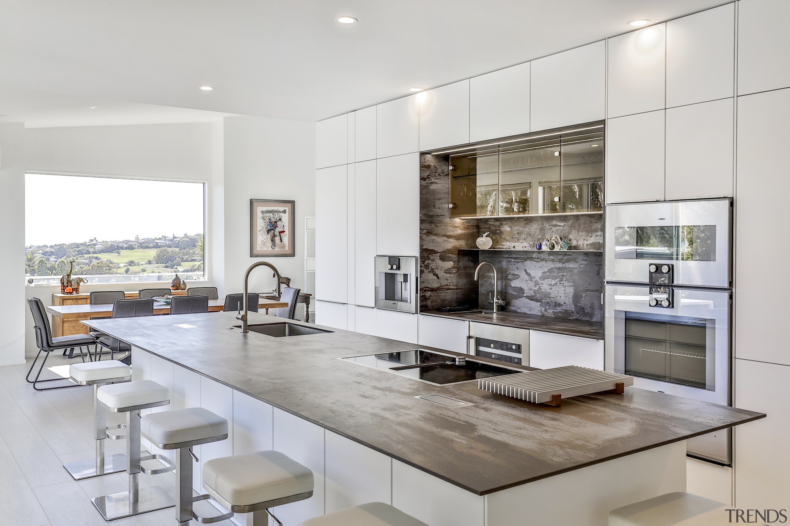 A wall of white and contemporary slender benchtops 