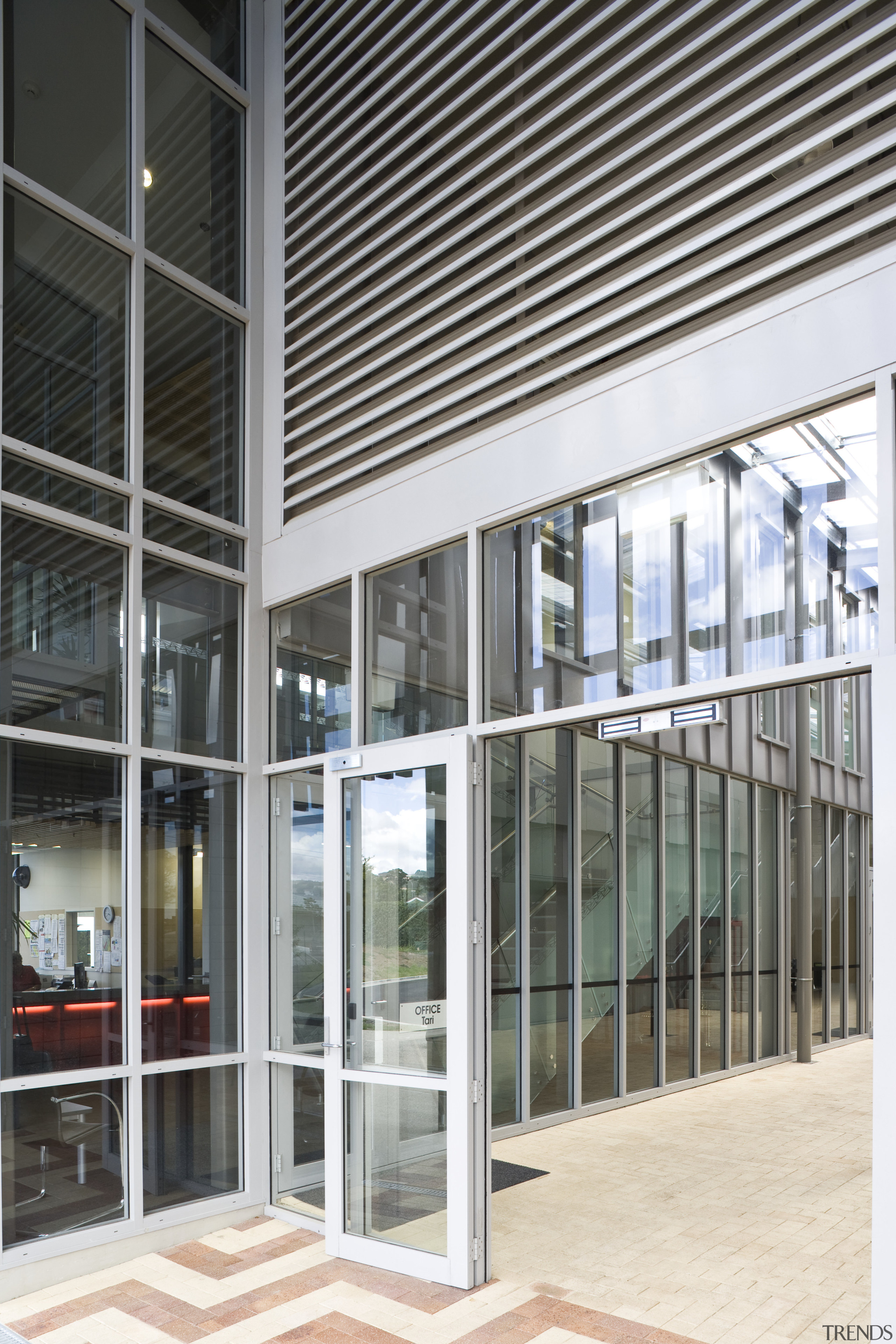 Exterior view of school which features aluminium sunscreen architecture, building, commercial building, daylighting, door, facade, glass, structure, window, white, gray, black