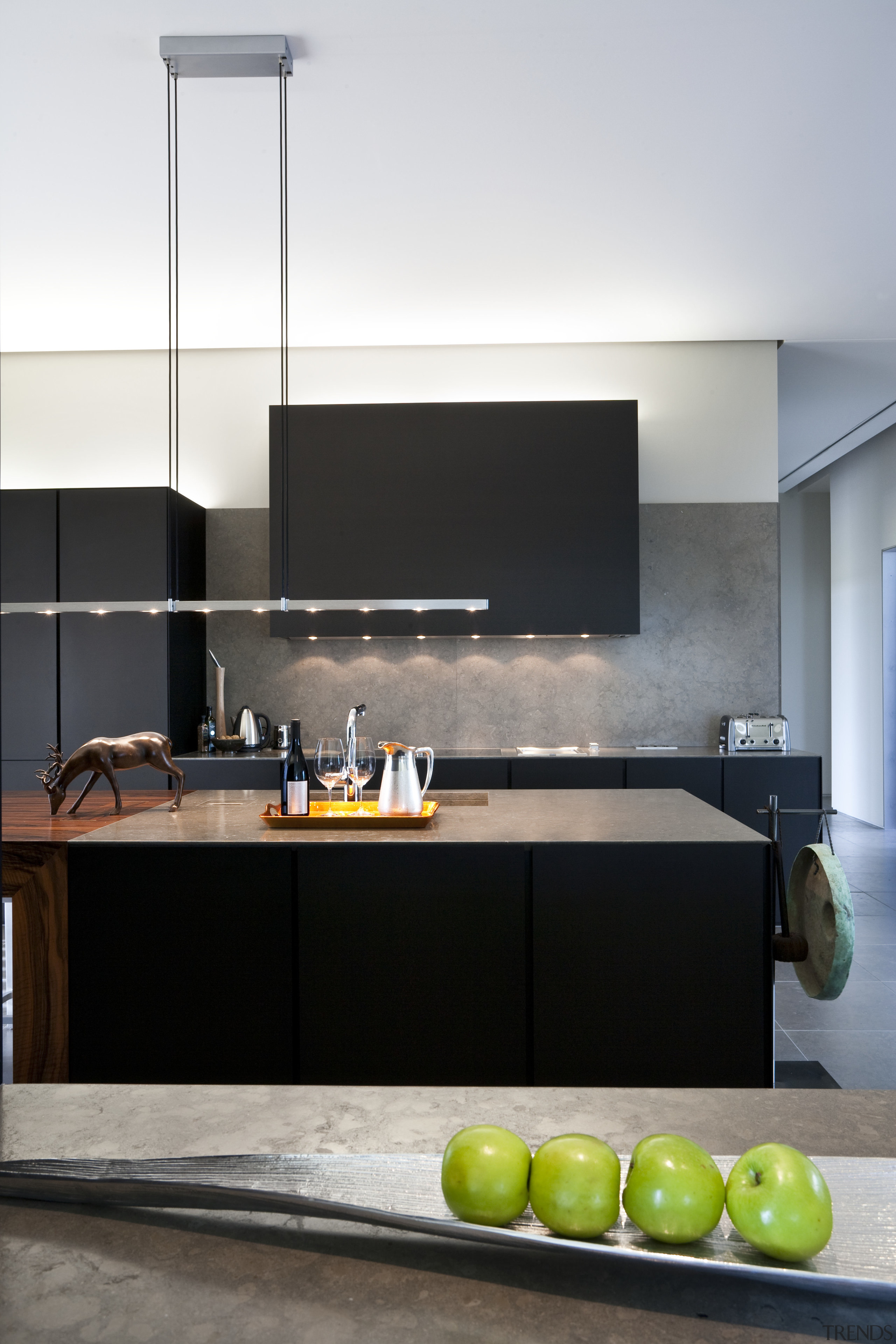 View of a contemporary kitchen which features island, architecture, countertop, interior design, kitchen, product design, white, black