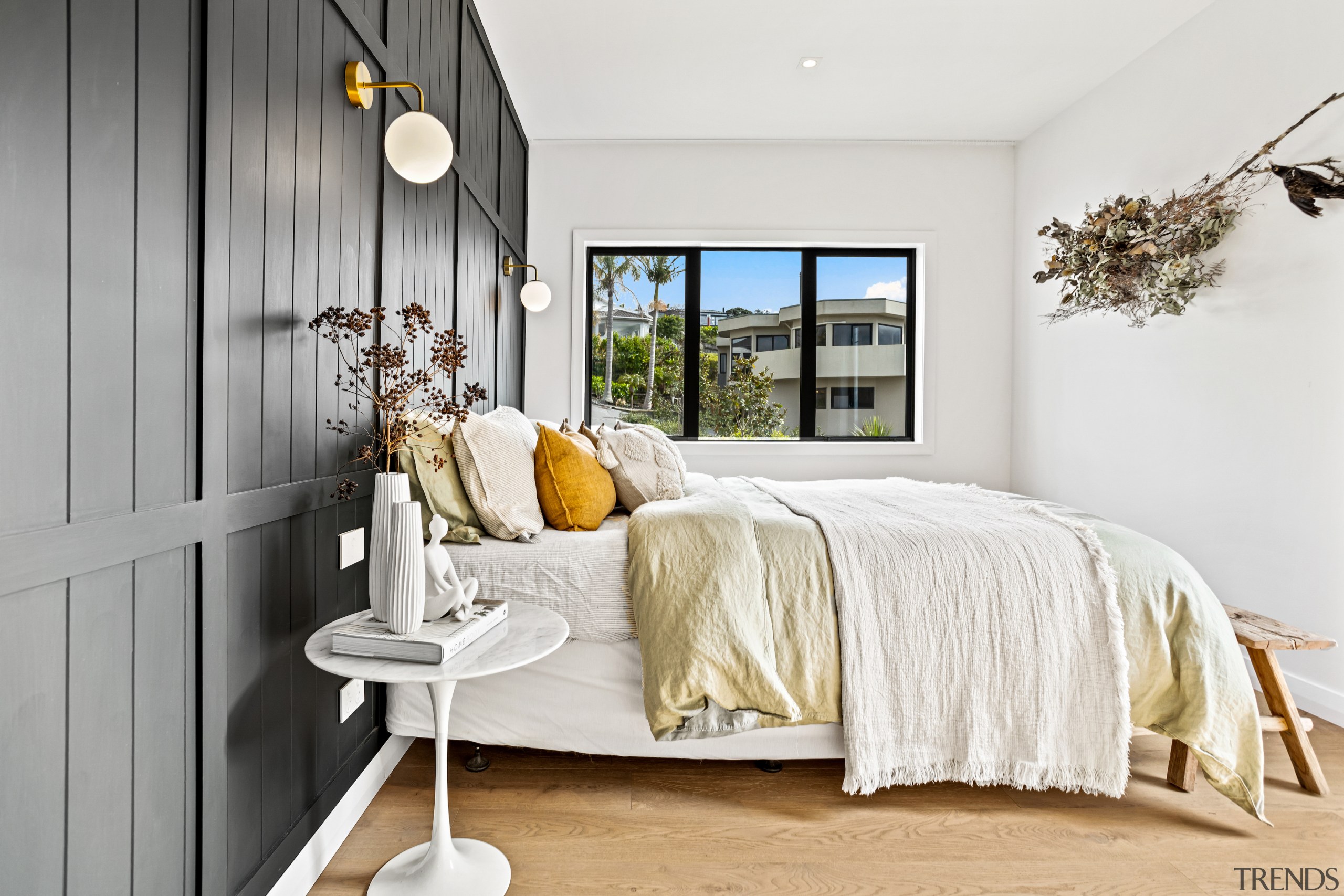 The guest bedroom with panelled wall. - Where 