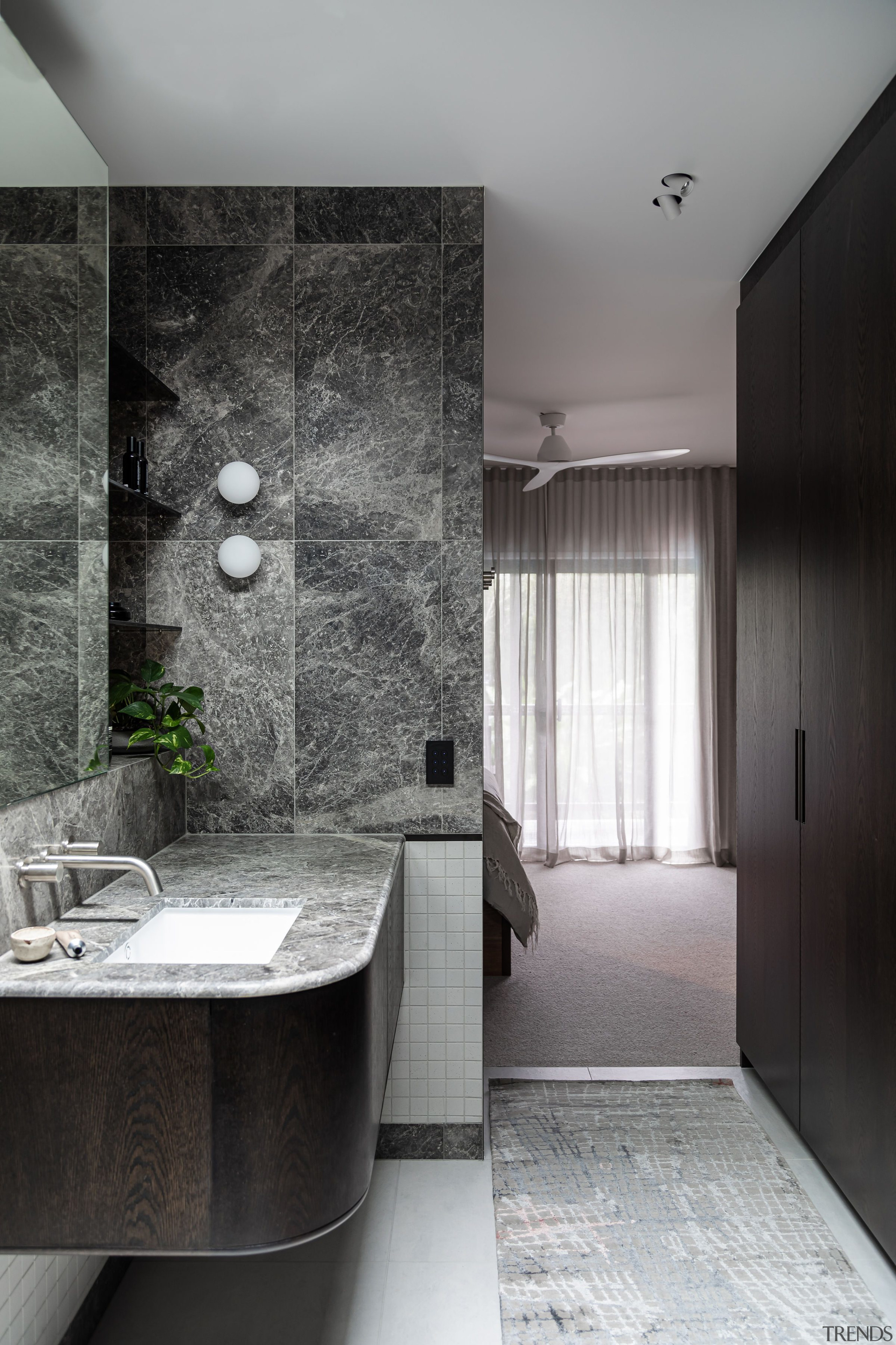 The staggered design layout allows the bathroom to 