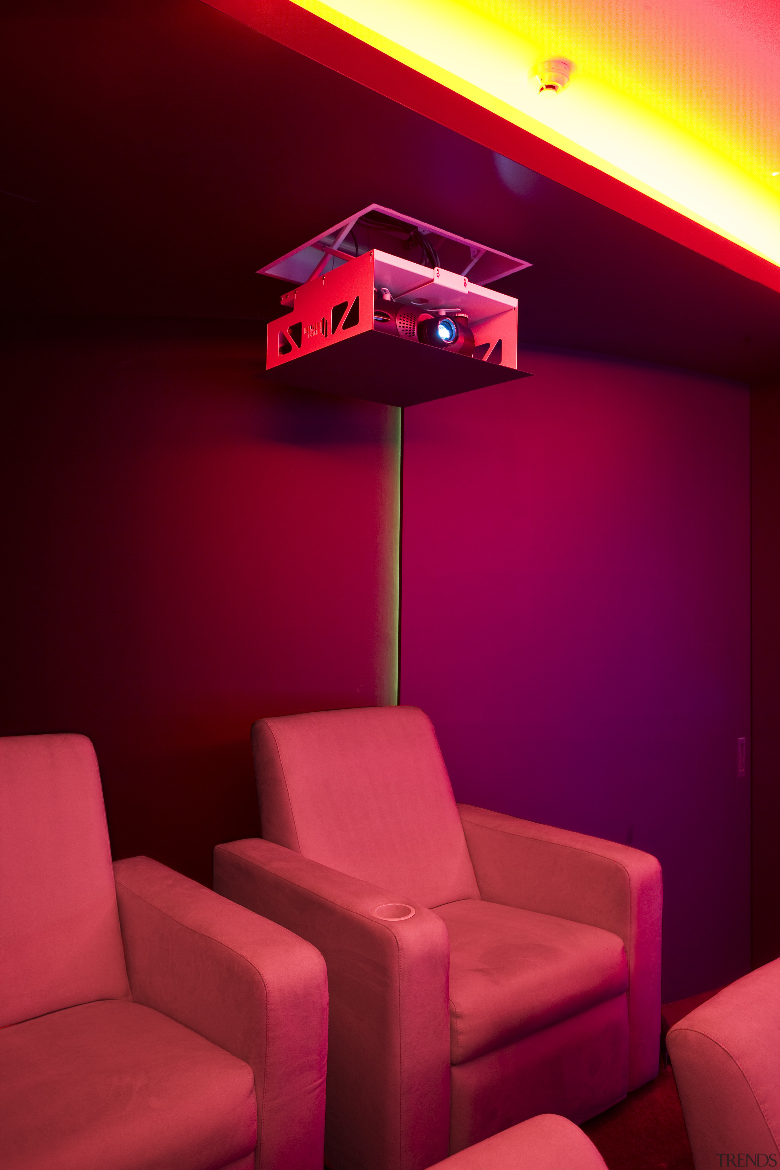View of home cinema with projector, audiovisual and ceiling, interior design, light, light fixture, lighting, red, red