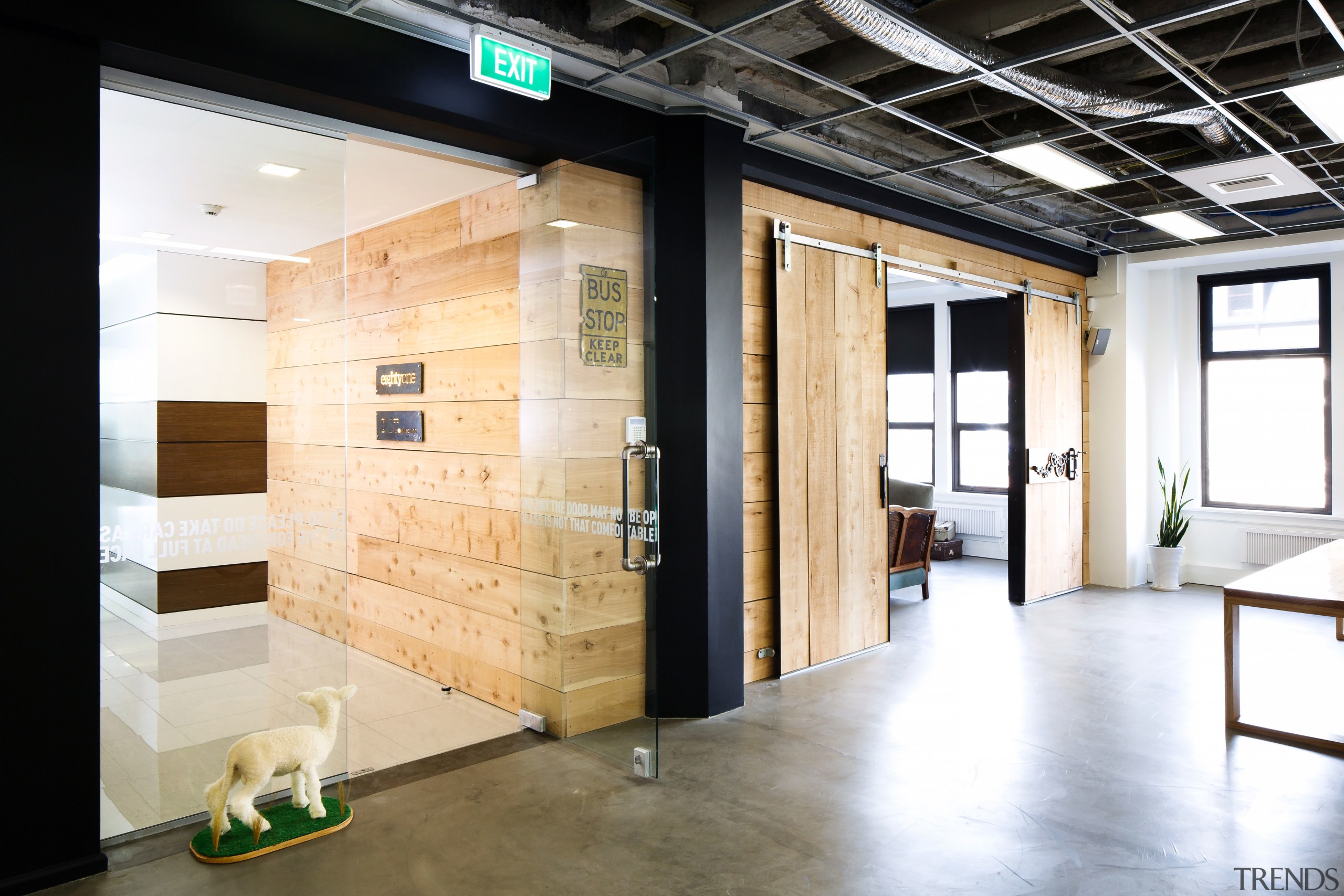 The meeting room, beside the entry to EightyOne, floor, flooring, interior design, white, black