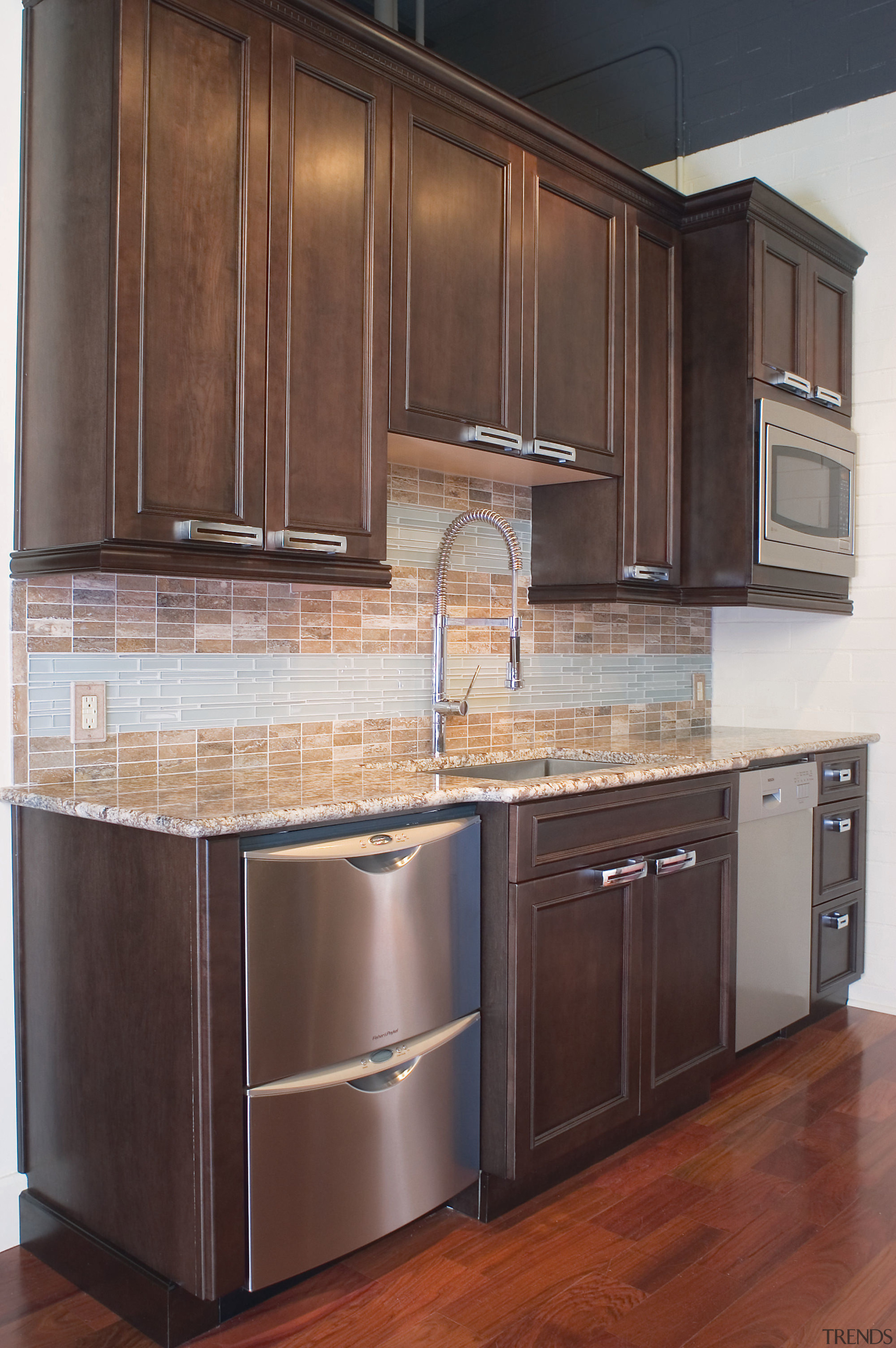 A view of these kitchens designed by Kitchen cabinetry, countertop, cuisine classique, furniture, hardwood, home appliance, kitchen, room, wood stain, red, black, gray