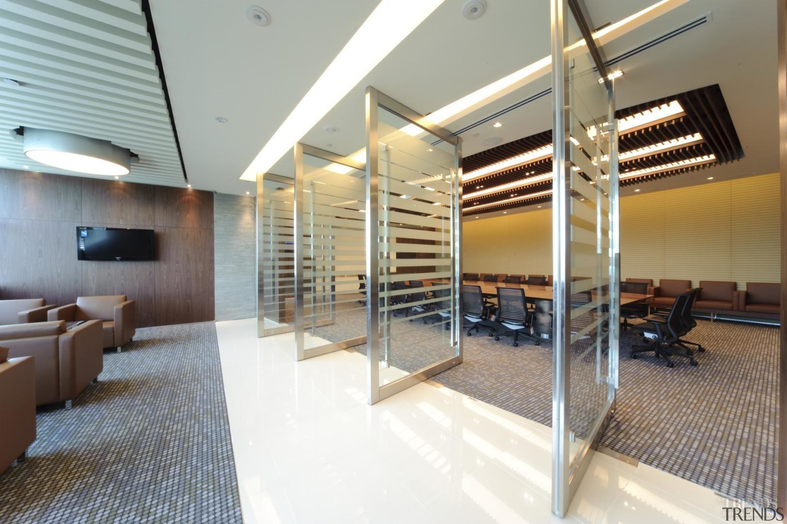 Meeting rooms have floor-to-ceiling swivel doors so spaces ceiling, interior design, real estate, gray