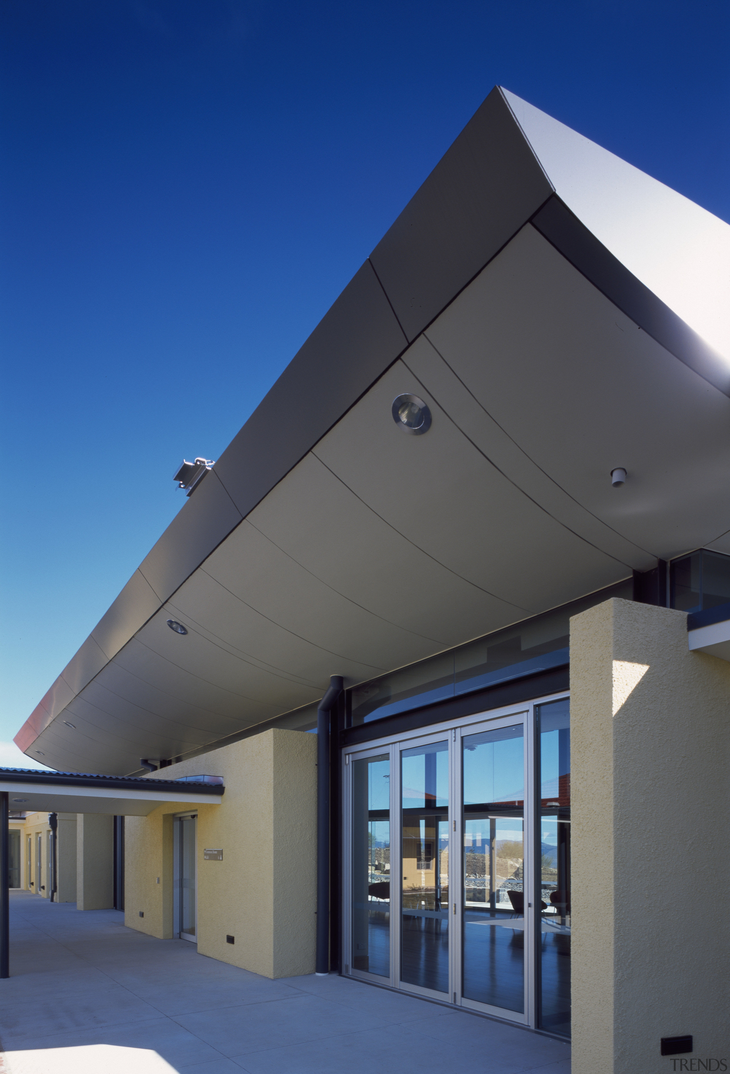 Exterior view of the observatory which features steel architecture, building, ceiling, daylighting, daytime, facade, house, real estate, roof, sky, structure, blue, gray