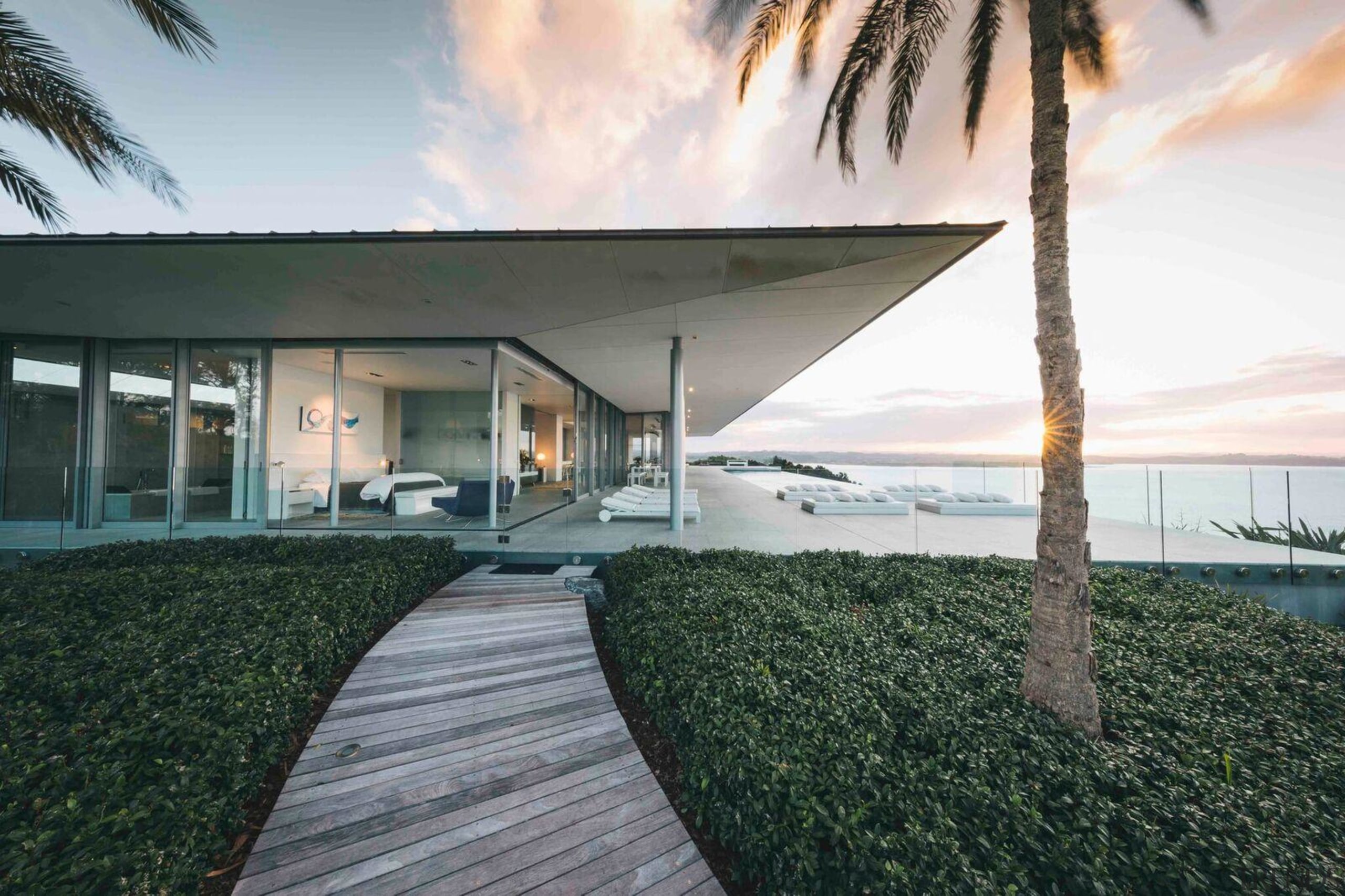 Eagles Nest, Bay of Islands, New Zealand - architecture, building, eco hotel, estate, facade, home, house, interior design, palm tree, property, real estate, resort, sky, tree, vacation, villa, gray, white