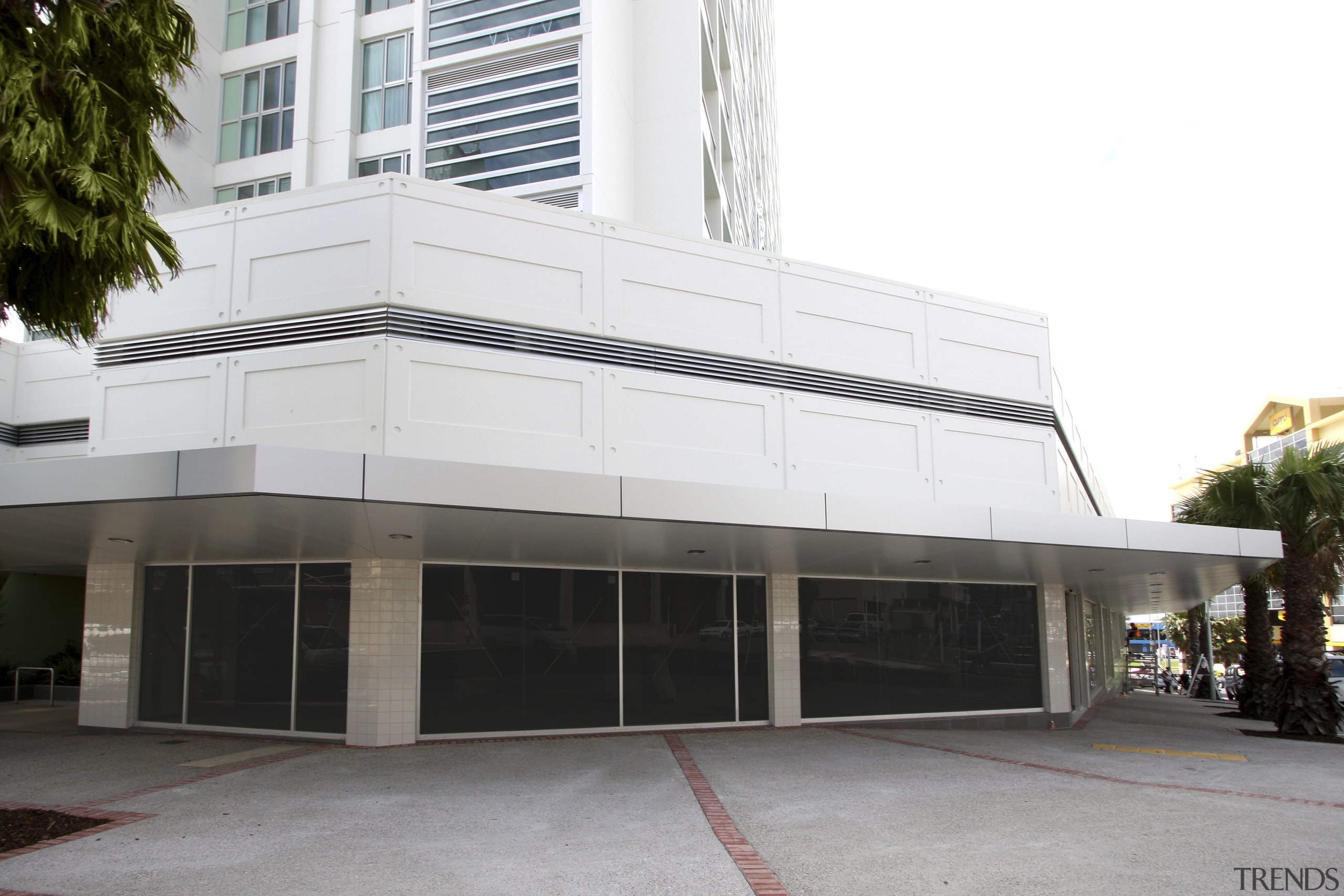 Exterior view of the entrance way of the building, commercial building, corporate headquarters, facade, property, real estate, white