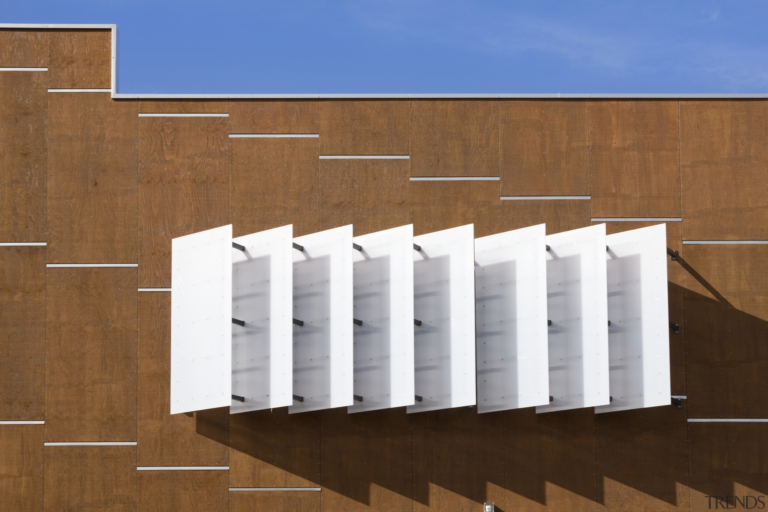 View of white shutters on the exterior facade architecture, daylighting, elevation, facade, line, roof, structure, brown