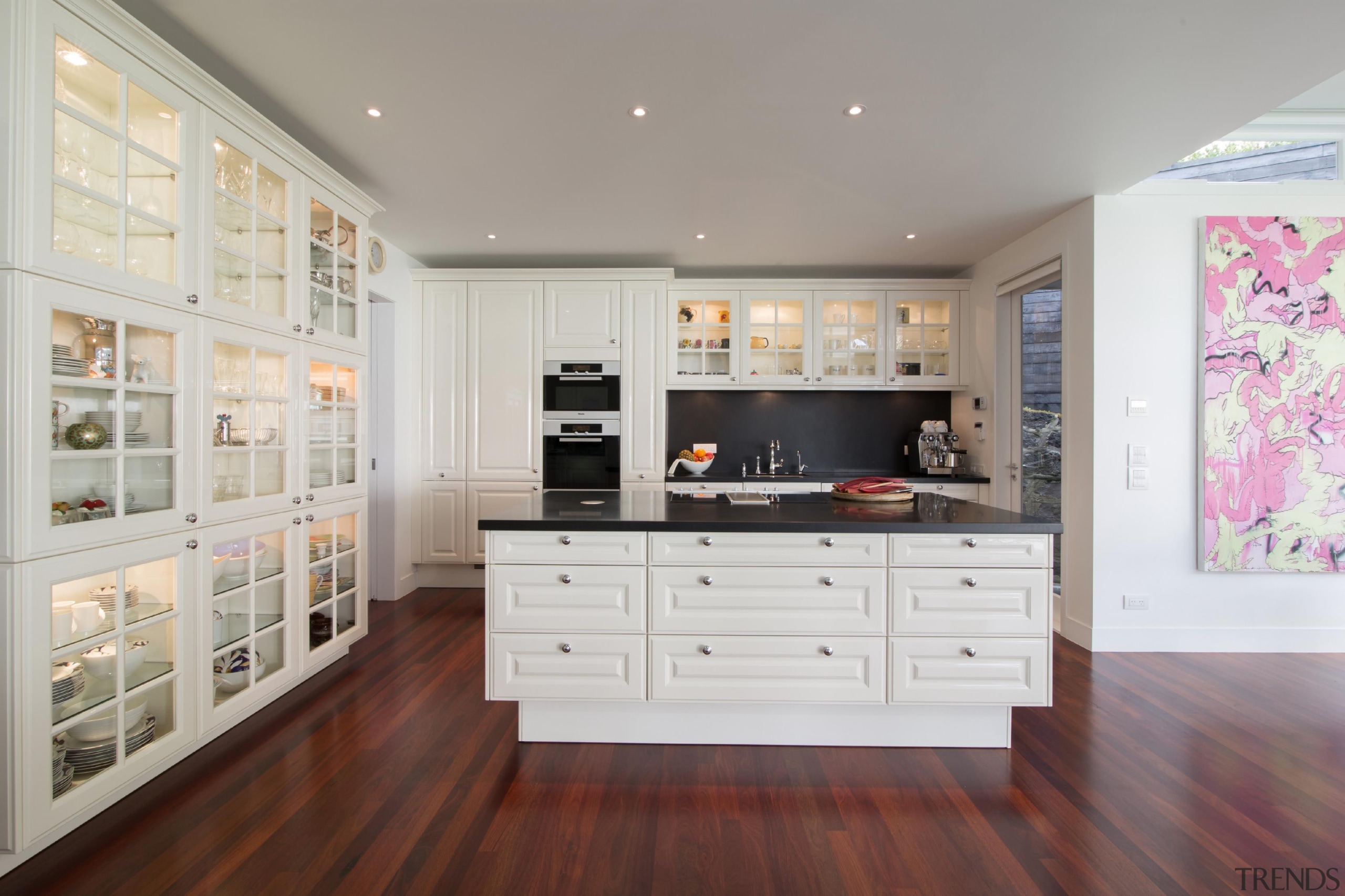 Contemporary technology is combined with timeless aesthetics and cabinetry, countertop, floor, flooring, home, interior design, kitchen, room, gray