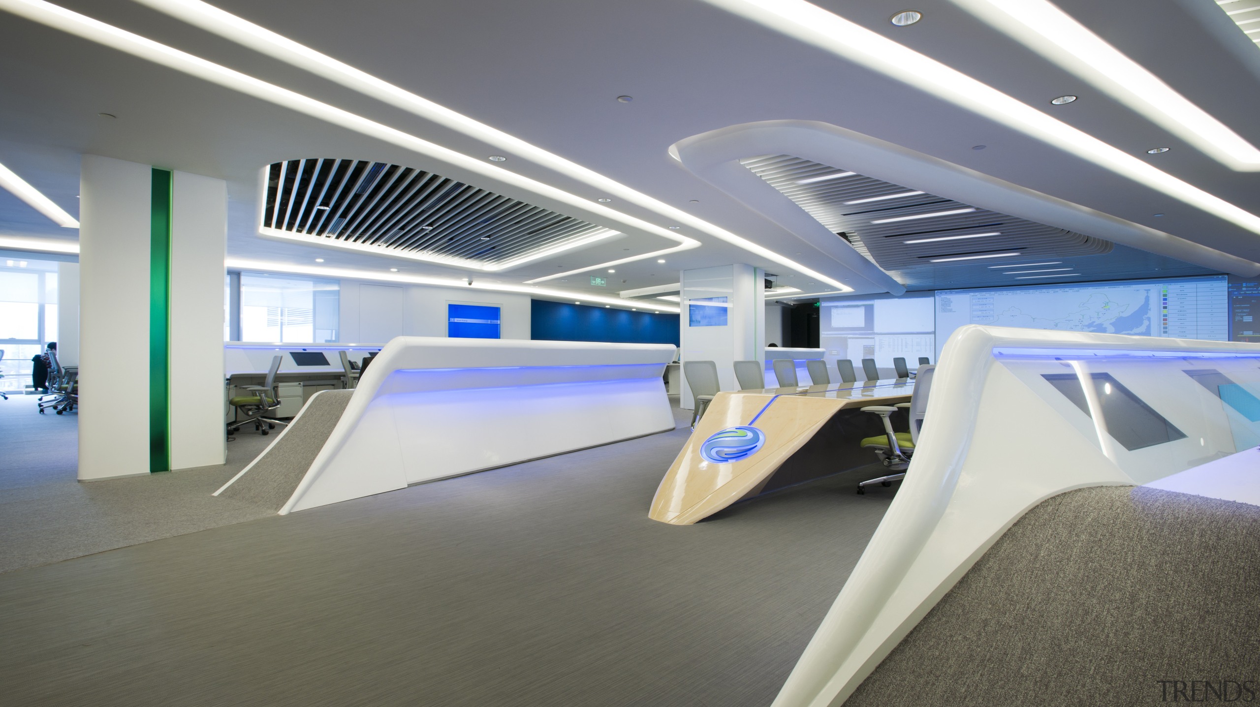 This high-tech office features workstations that were custom architecture, product design, gray