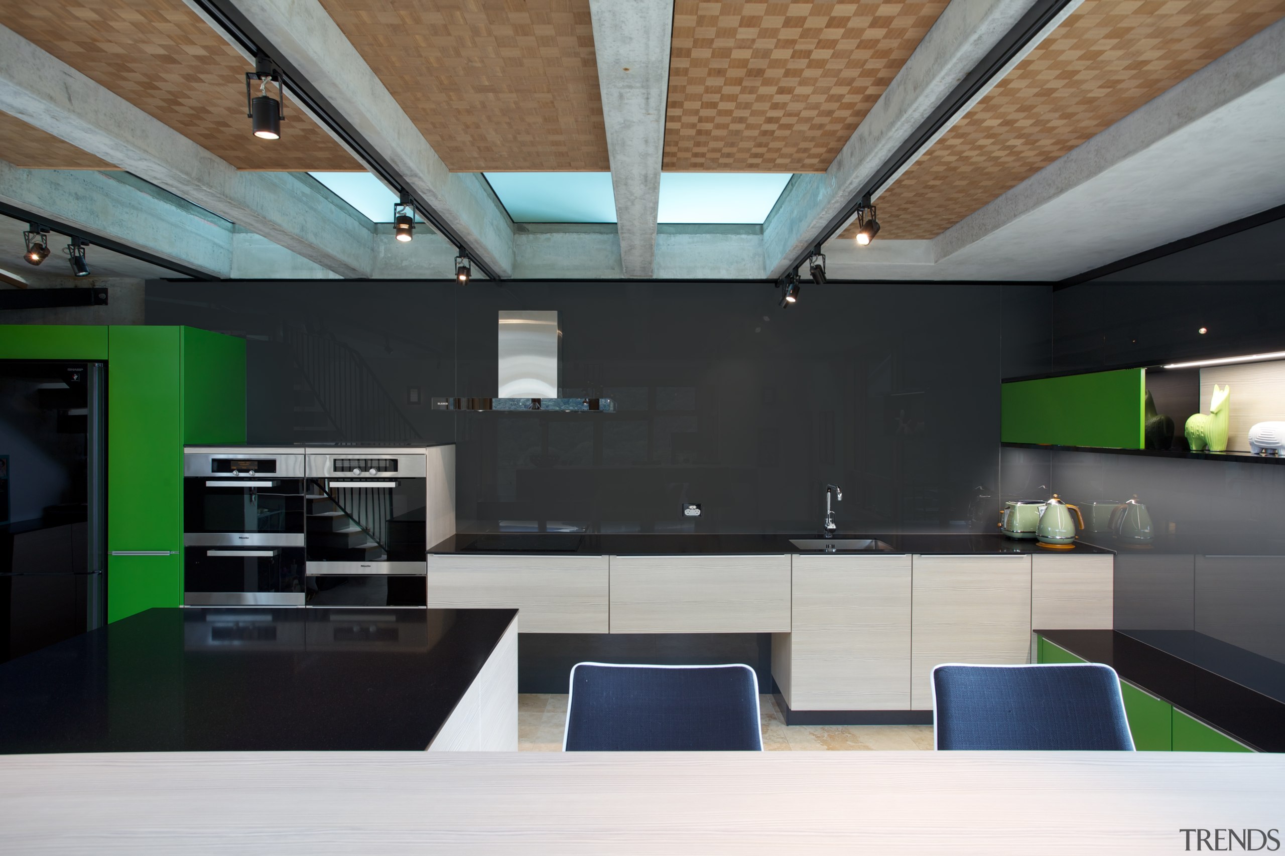 A black glass splashback and black quartz stone architecture, ceiling, daylighting, house, interior design, black