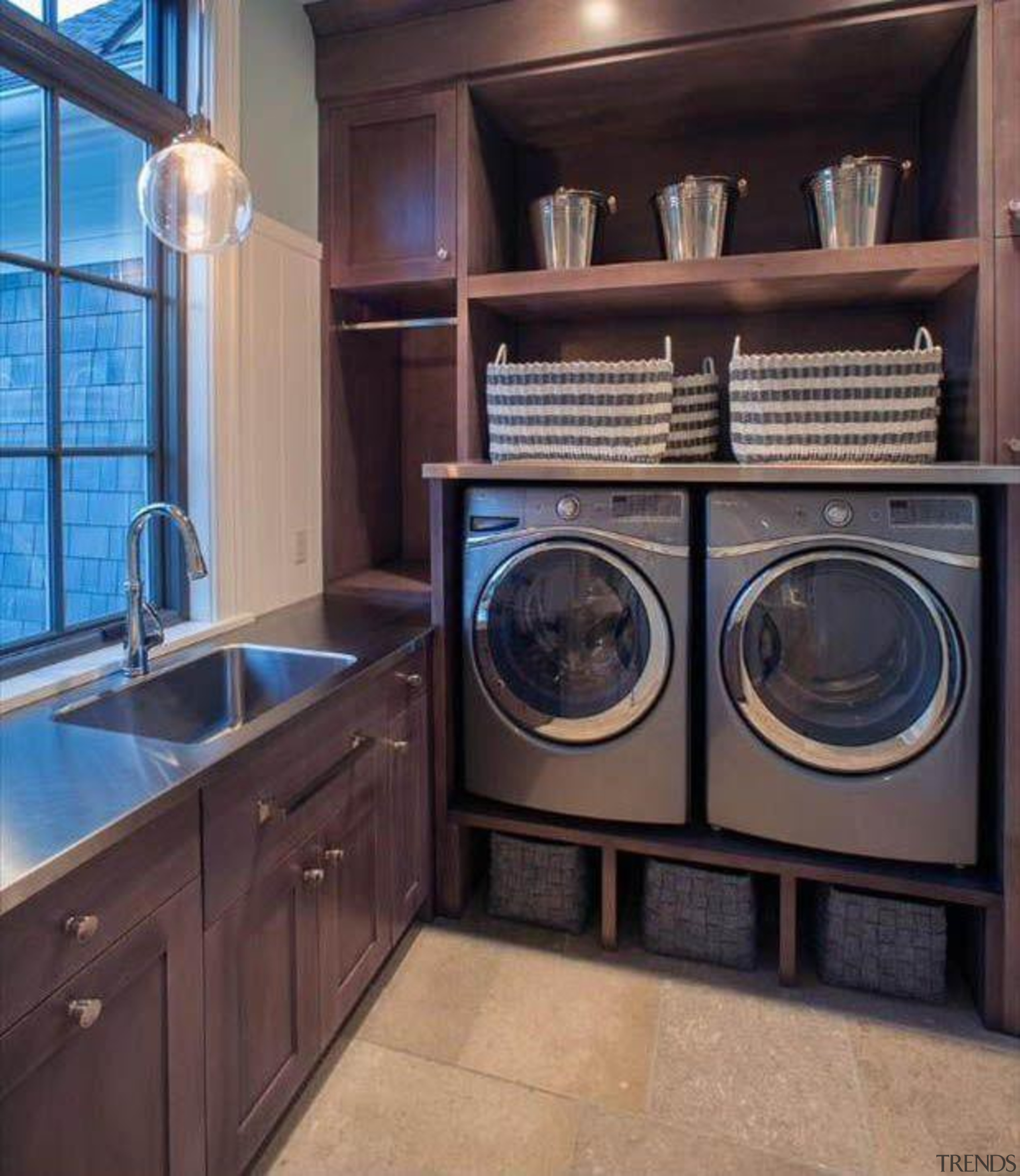 Utilitarian spaces such as laundry rooms and mudrooms cabinetry, countertop, home appliance, kitchen, laundry, laundry room, major appliance, room, washing machine, black