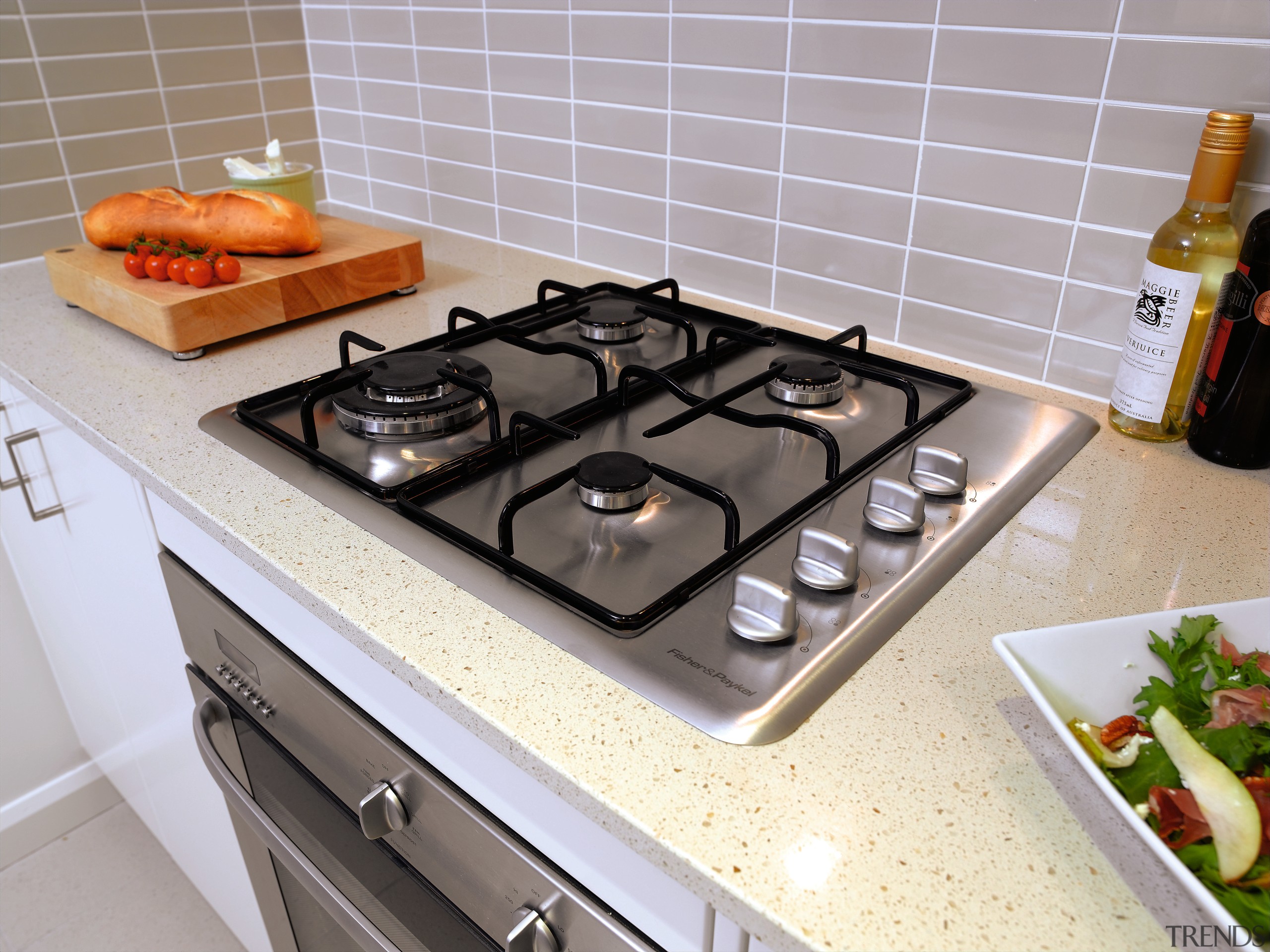 A view of some kitchen appliances from Fisher cookware and bakeware, countertop, gas stove, home appliance, kitchen, kitchen appliance, kitchen stove, gray
