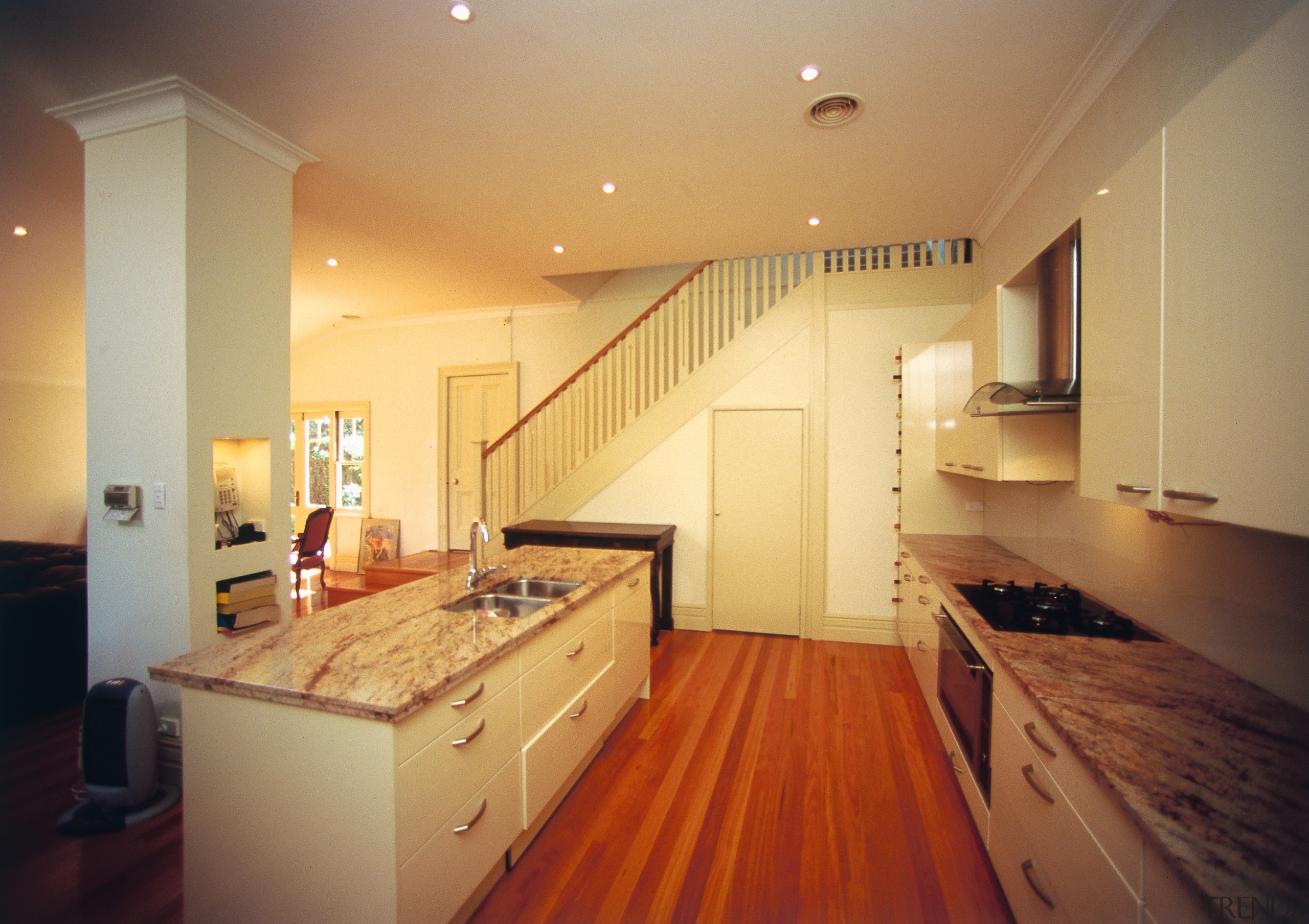 A view of a cottage renovated by Cape cabinetry, ceiling, countertop, floor, flooring, hardwood, home, house, interior design, kitchen, lighting, real estate, room, wood, wood flooring, orange