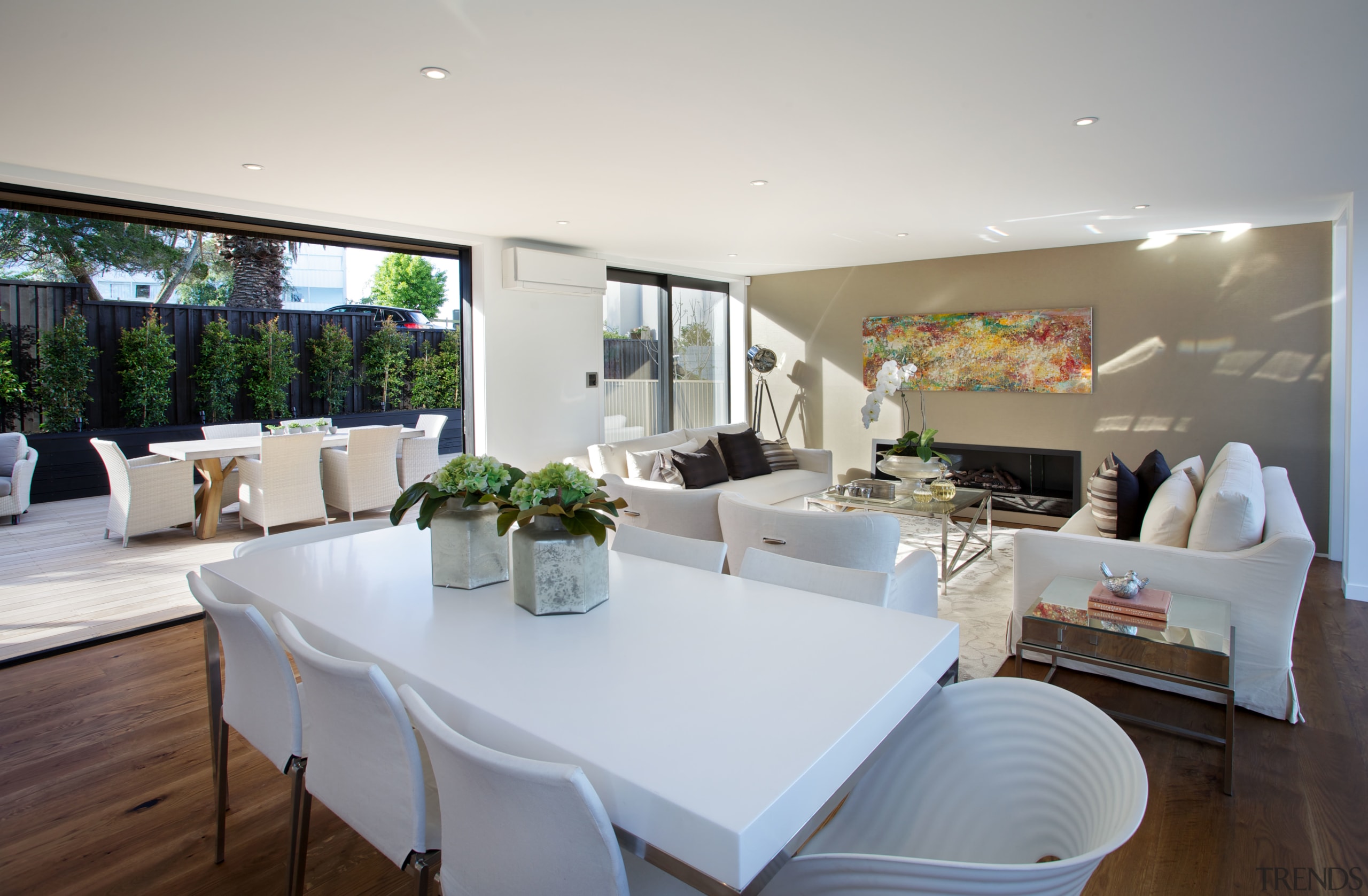 This Parnell townhouse designed by Paul Izzard has dining room, home, house, interior design, living room, property, real estate, room, table, gray