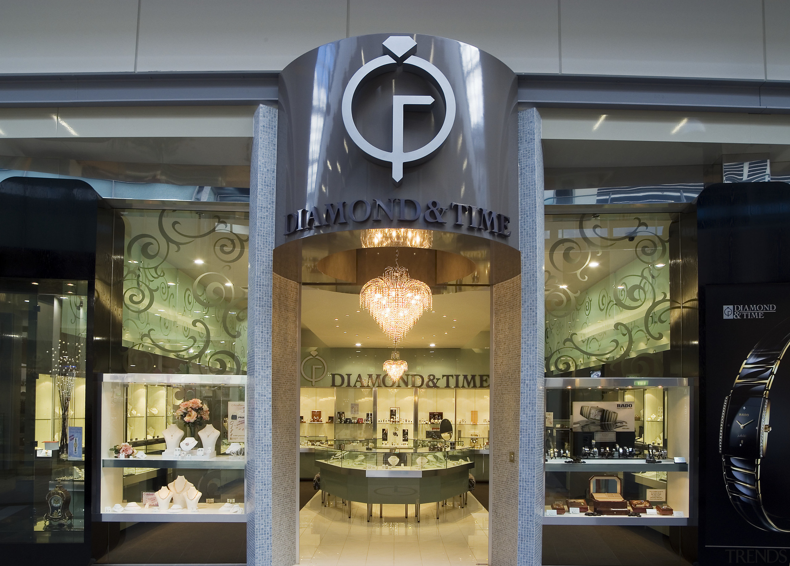 An exterior view of the Diamong &amp; Time interior design, retail, gray, black