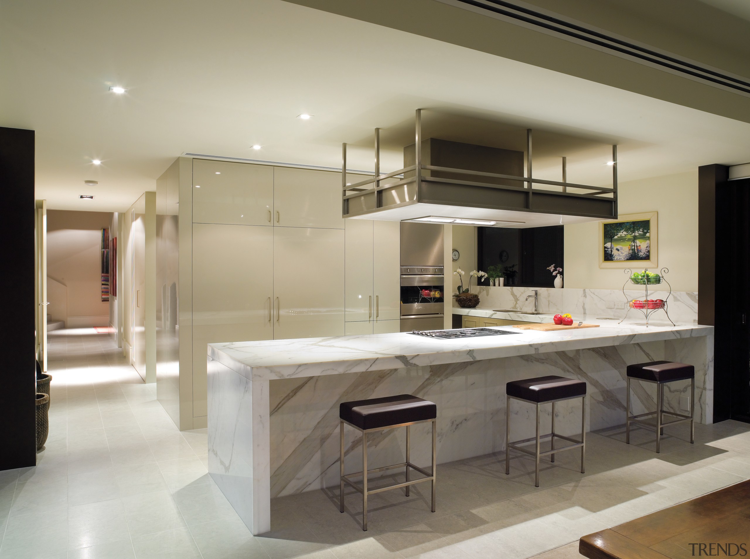 A view of this kitchen featuring clalcutta marble cabinetry, countertop, cuisine classique, interior design, kitchen, gray