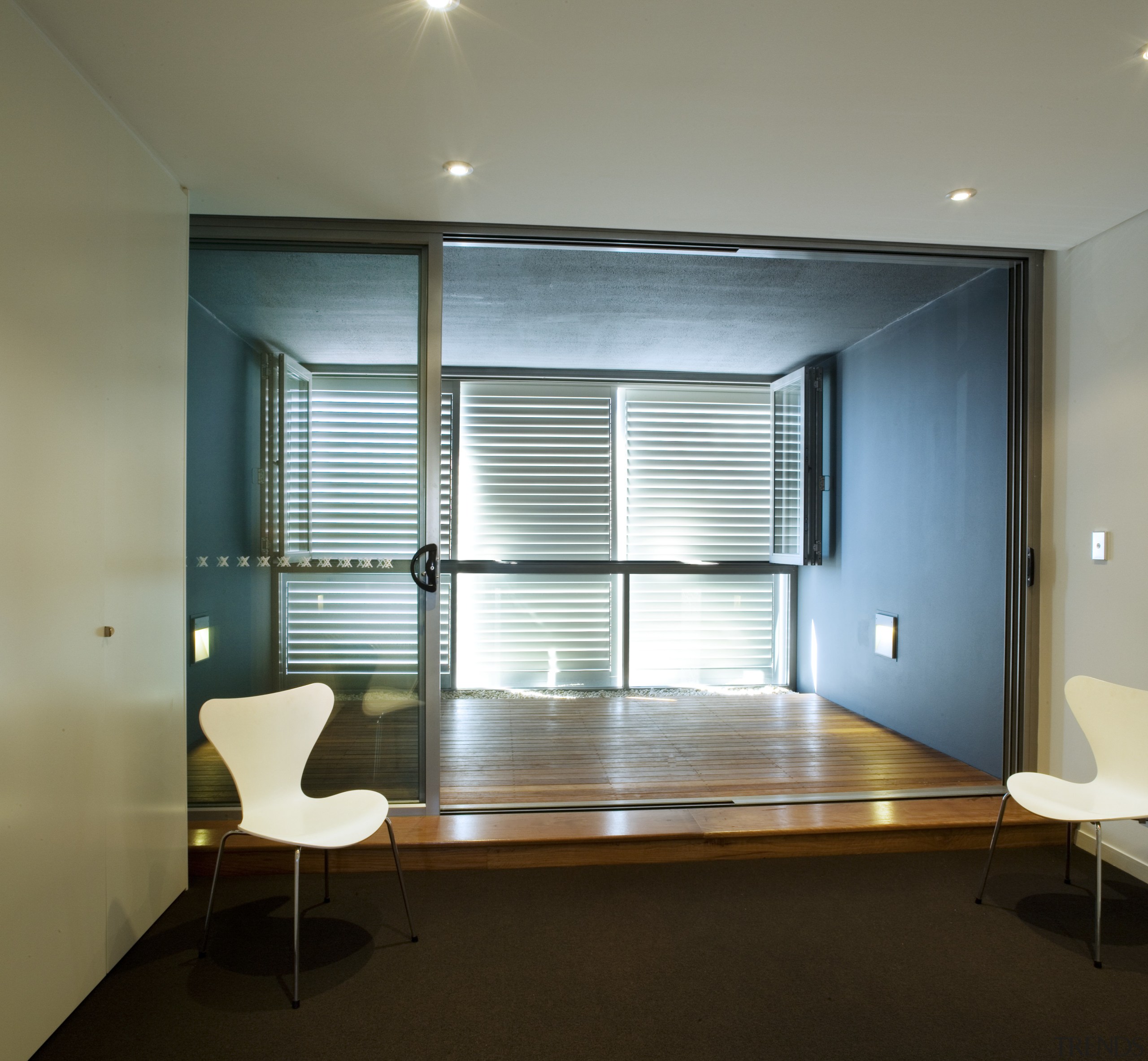 Interior view of Coda apartments featuring sliding doors, architecture, ceiling, daylighting, floor, glass, house, interior design, real estate, room, wall, window, window covering, window treatment, gray