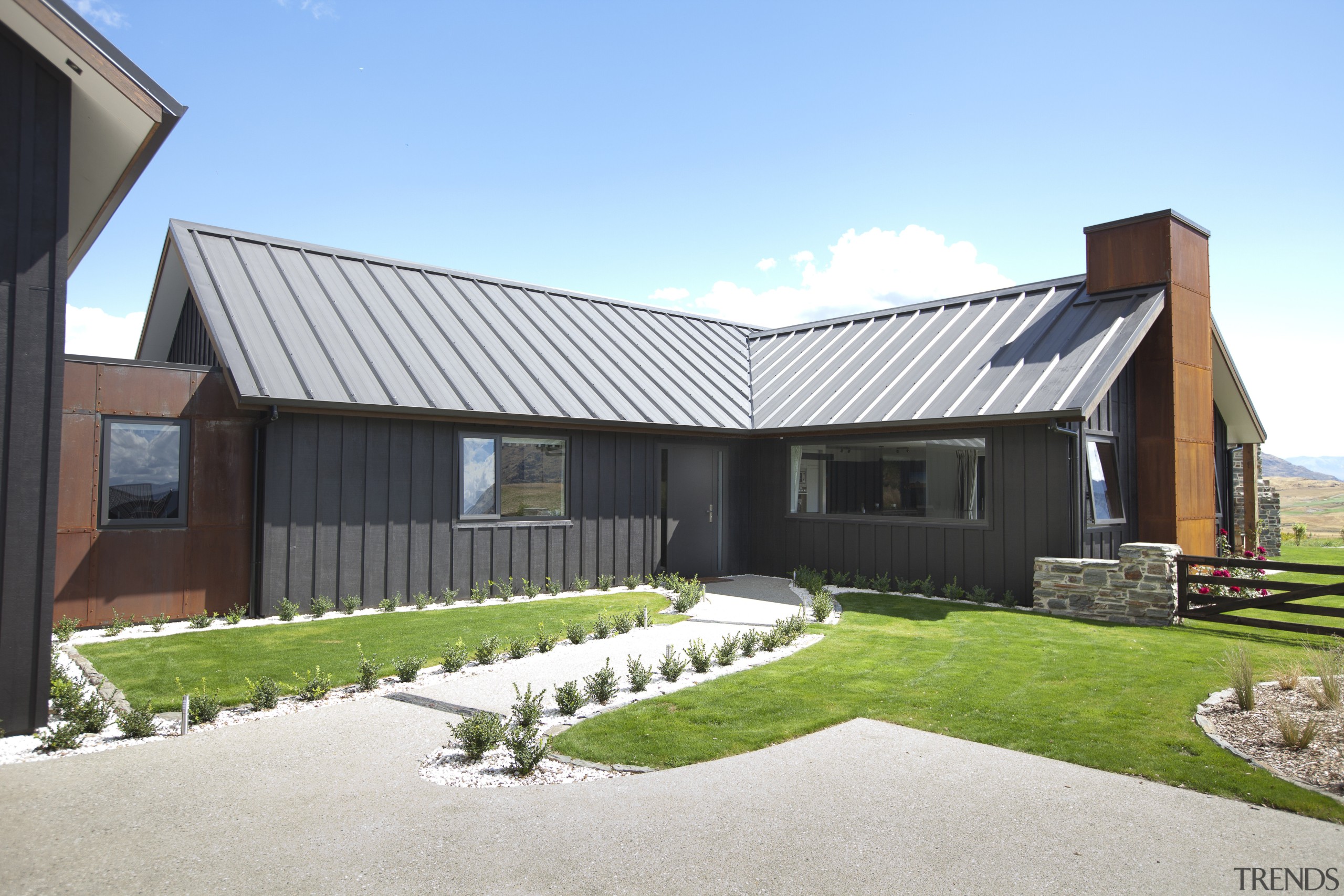 View of contemporary grey home with path leading architecture, cottage, elevation, facade, farmhouse, home, house, property, real estate, residential area, roof, siding, white