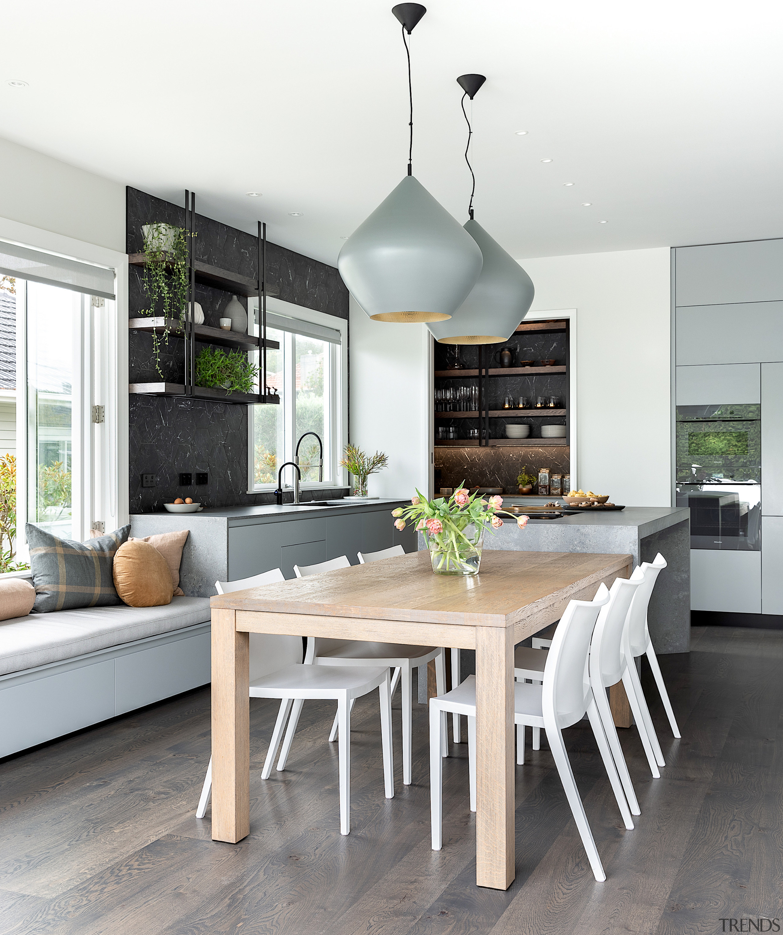 Tom Dixon Beat pendant lamps over the dining 