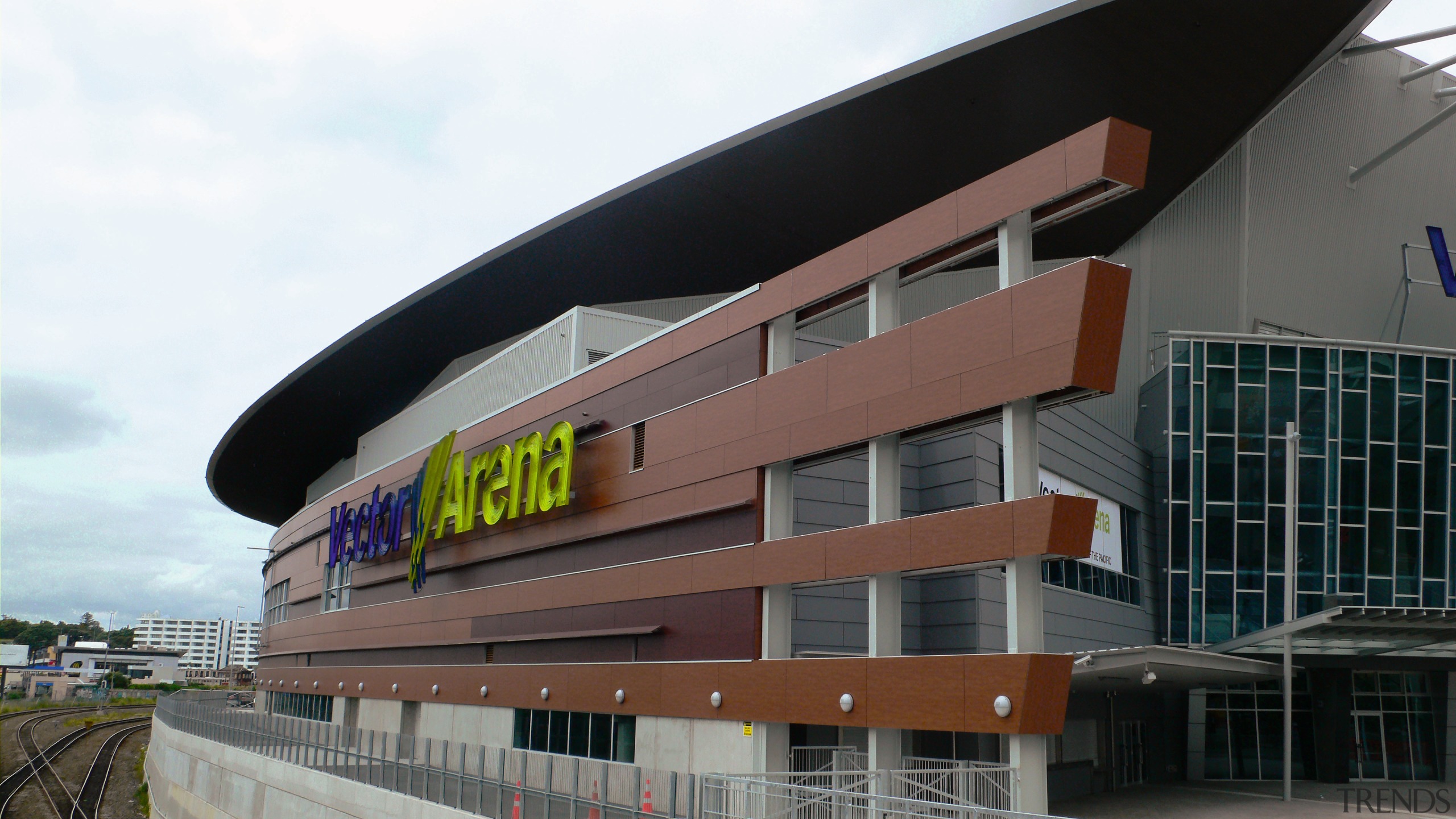 A view of the Vector Arena. - A architecture, building, commercial building, corporate headquarters, facade, metropolitan area, mixed use, sport venue, structure, black, white