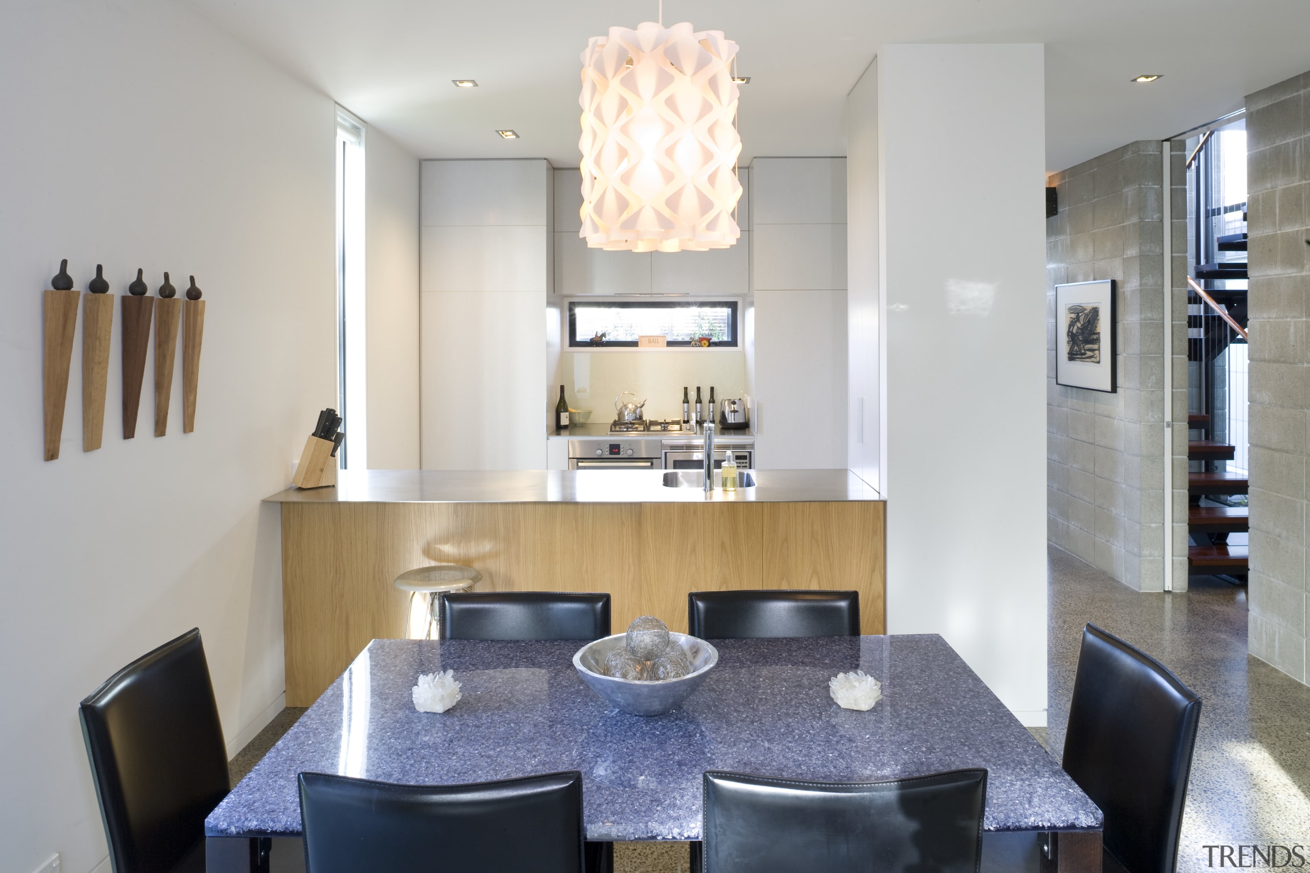 View of dining area which features a contemporary architecture, dining room, furniture, interior design, kitchen, real estate, room, table, gray