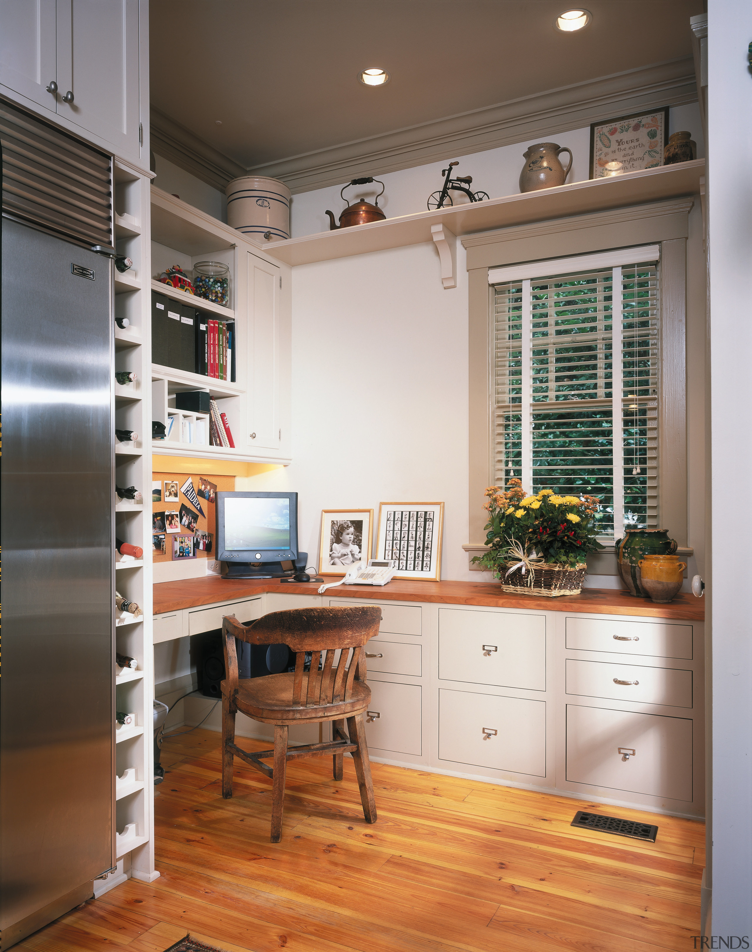 view of the study that adjoins the colonial cabinetry, countertop, floor, furniture, hardwood, home, interior design, kitchen, room, shelving, table