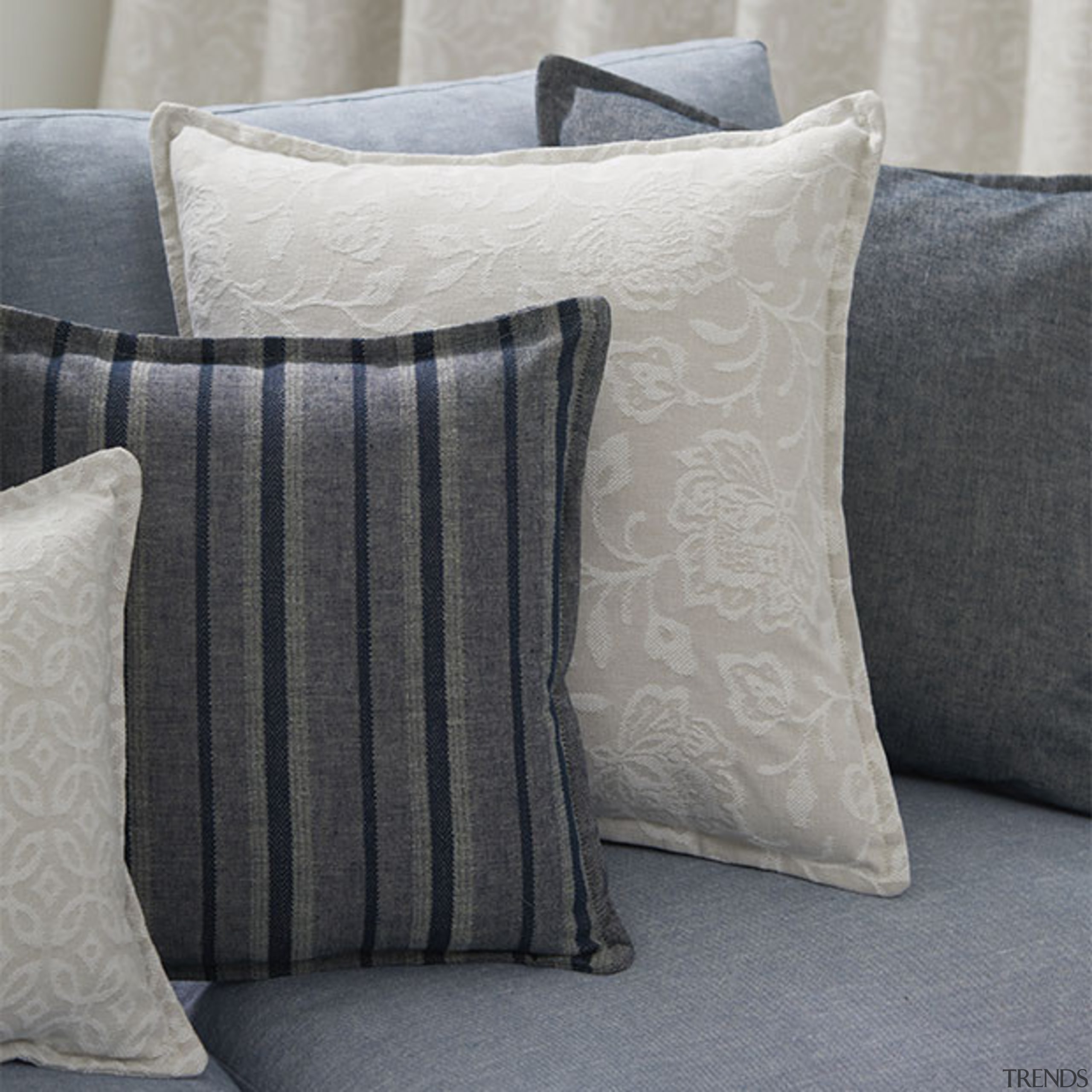 Offering a calm coastal aesthetic and soft tactile cushion, duvet cover, furniture, linens, pillow, textile, throw pillow, gray, black