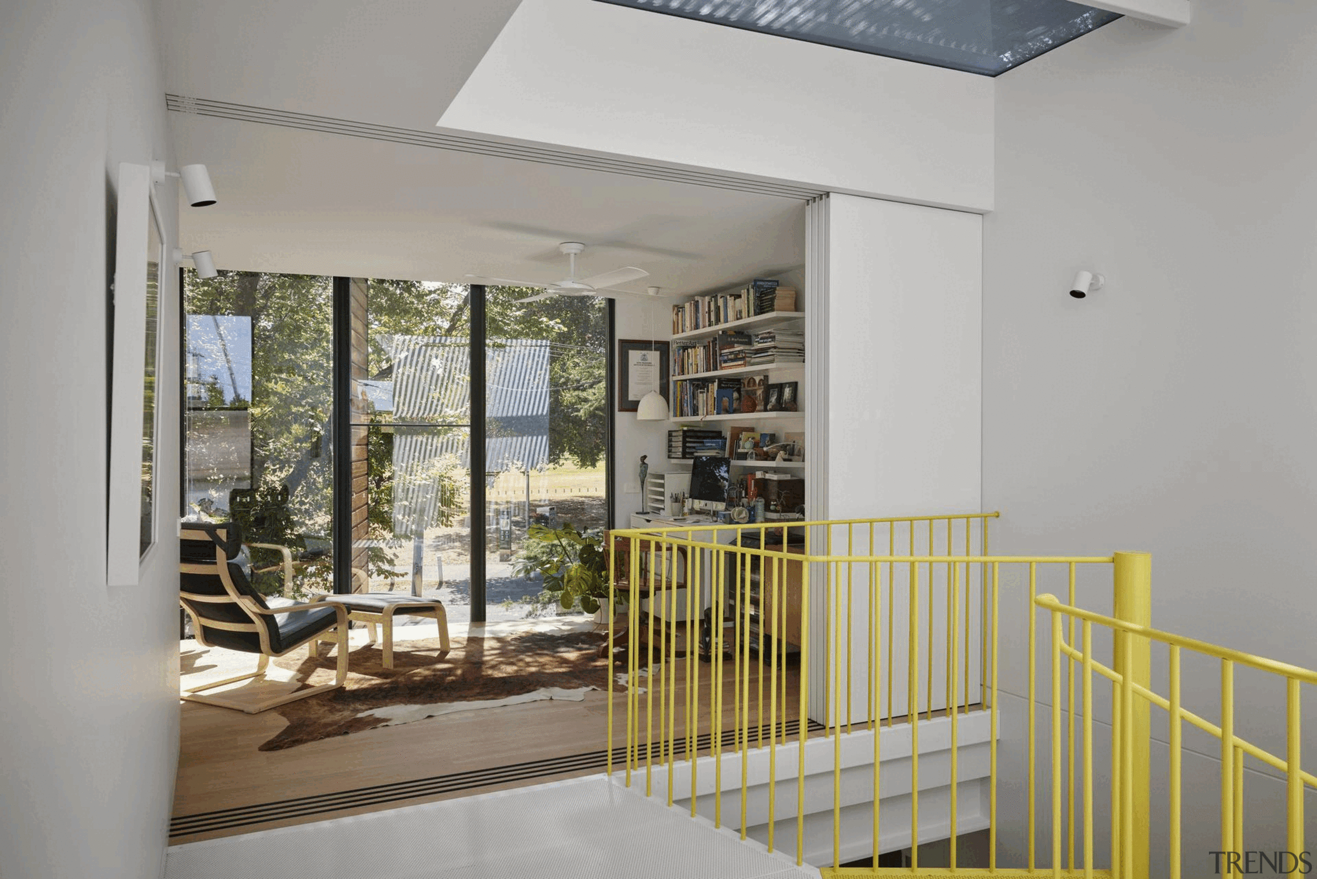 The studio has full height windows (overlooking the 