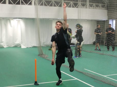 Matt Milnes bowls in nets