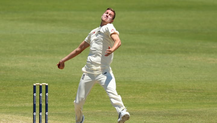 Jake Ball bowling in Oz