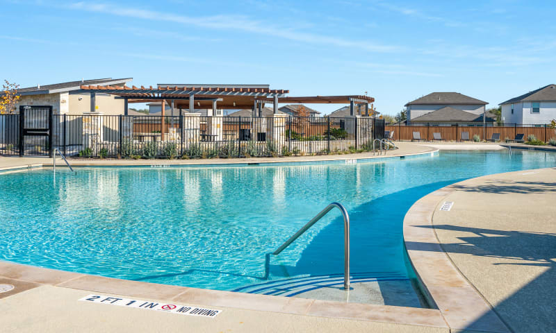 Photo of pool area, amenity center and pavilion.
