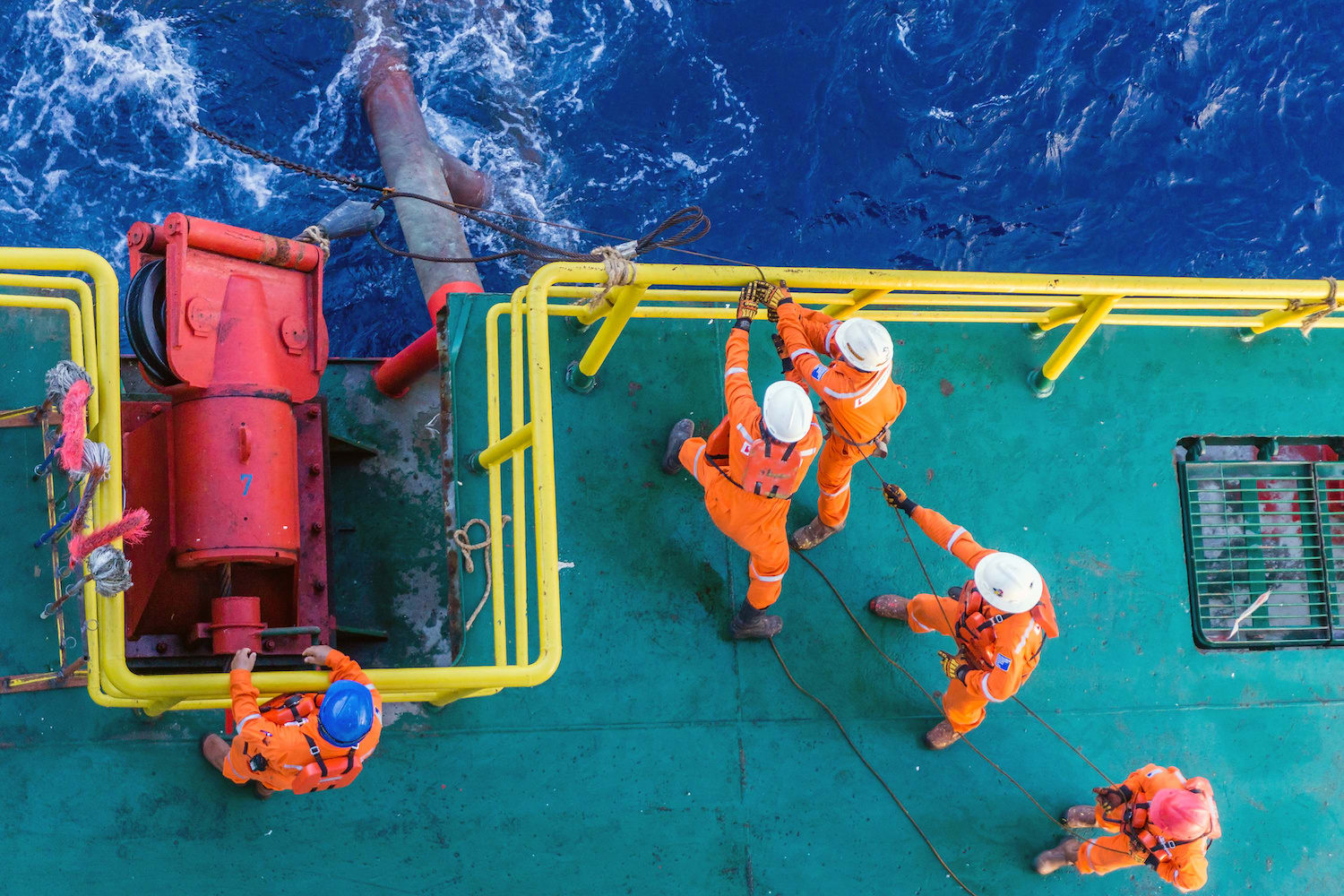 Crew workers on a barge.