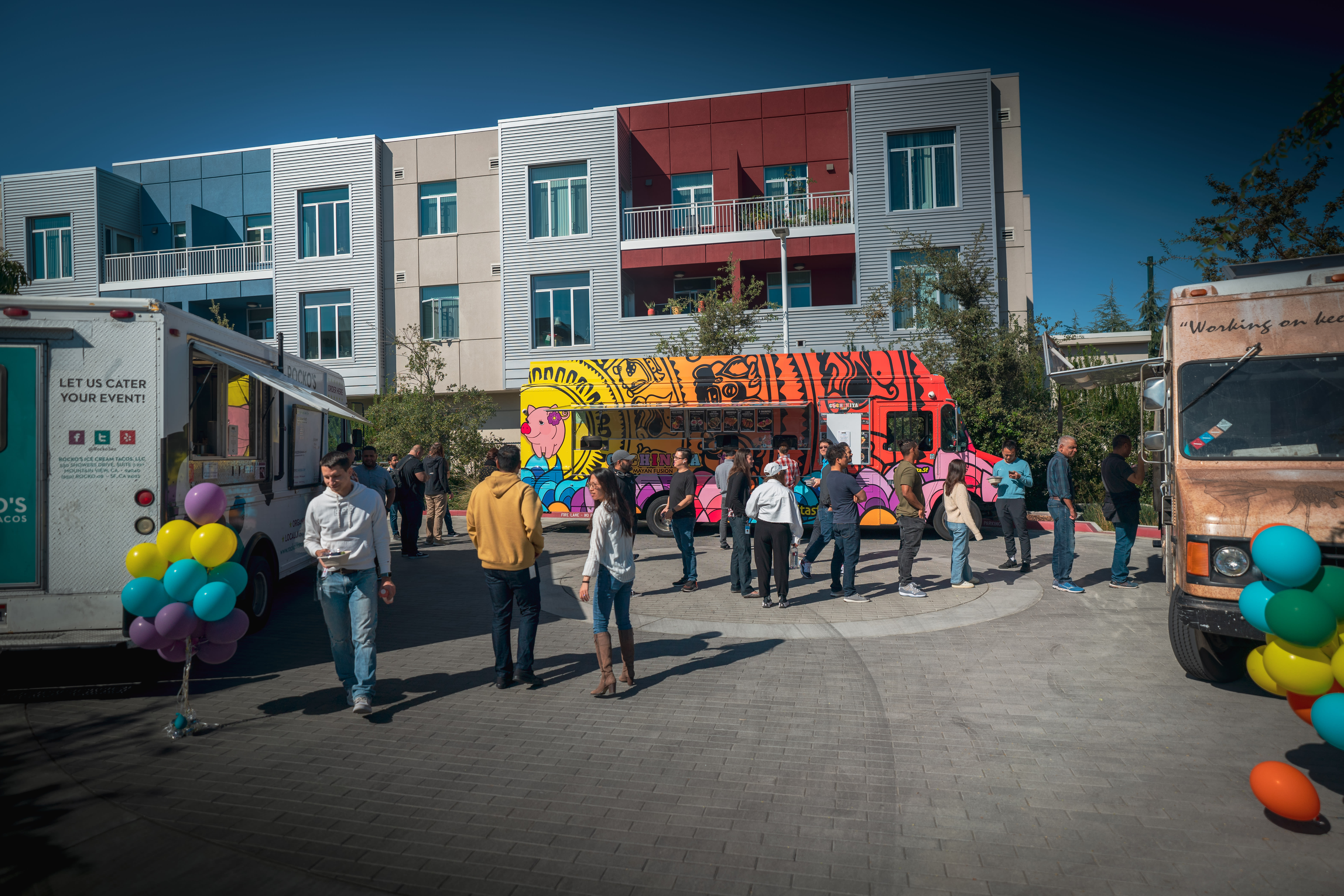 TripActioners enjoy lunch from food trucks.