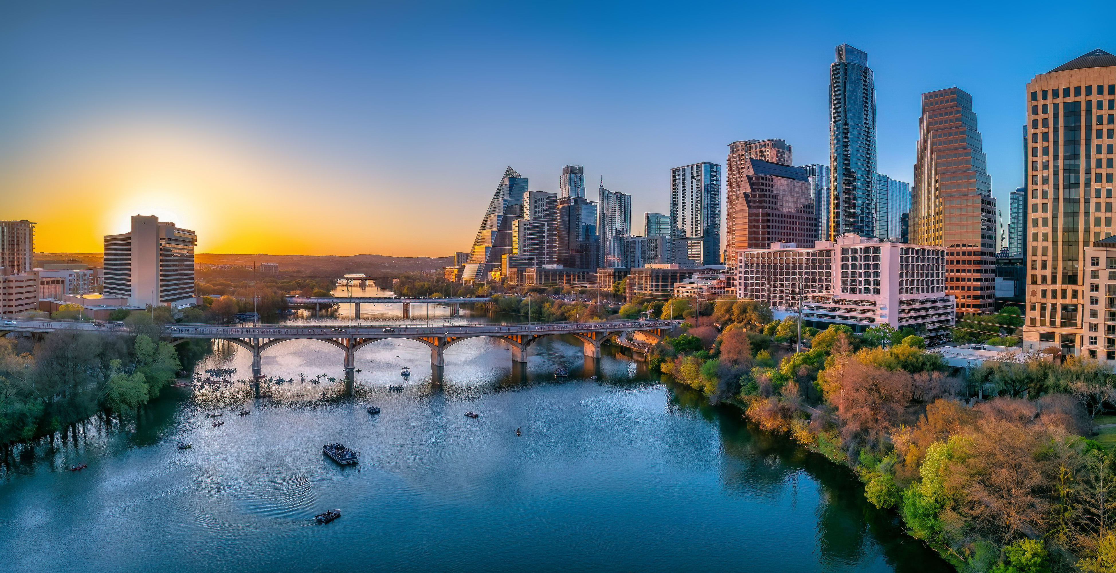 The sun sets over downtown Austin.
